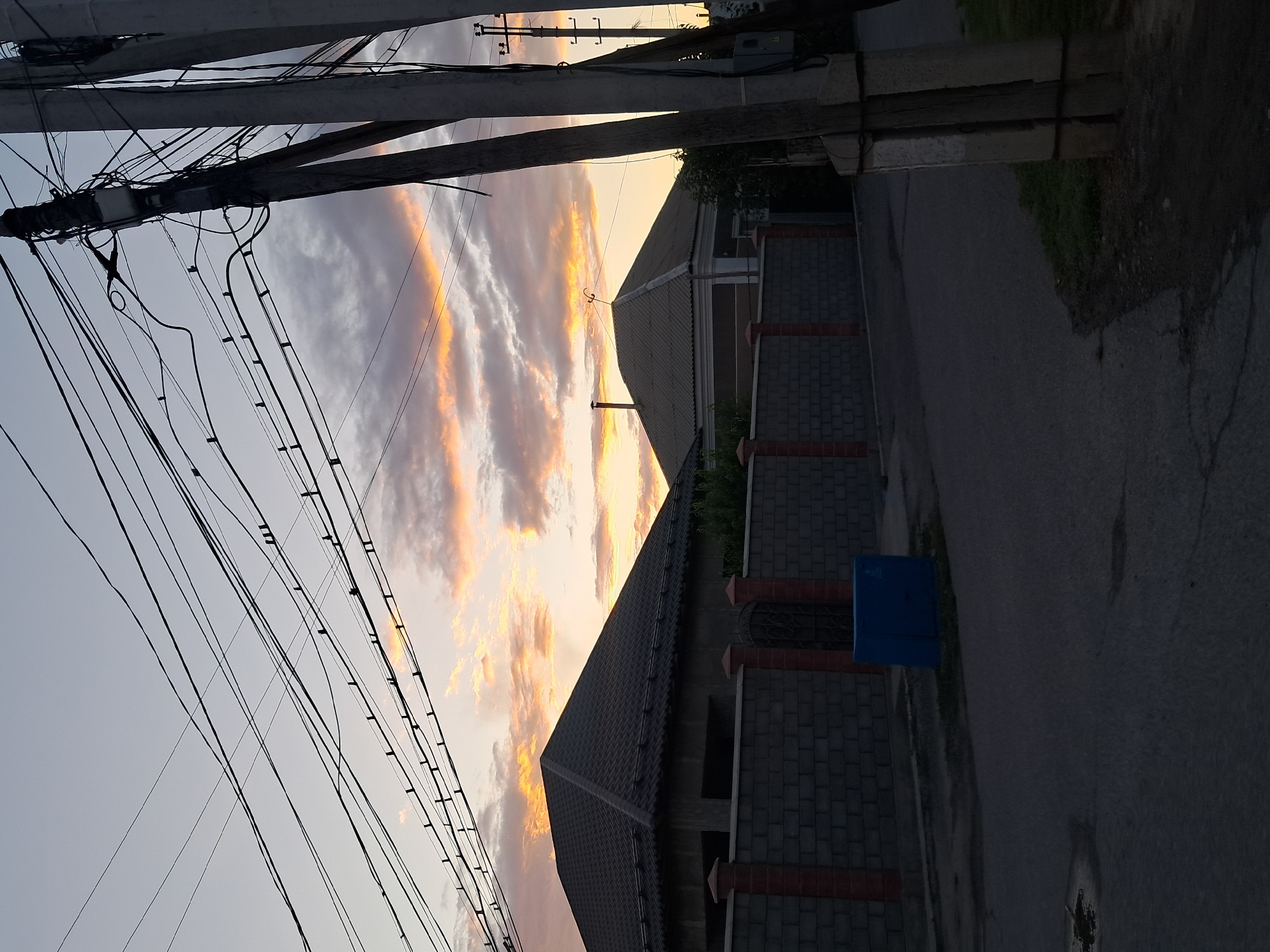Dusk settles over a mosque and streets in Shymkent