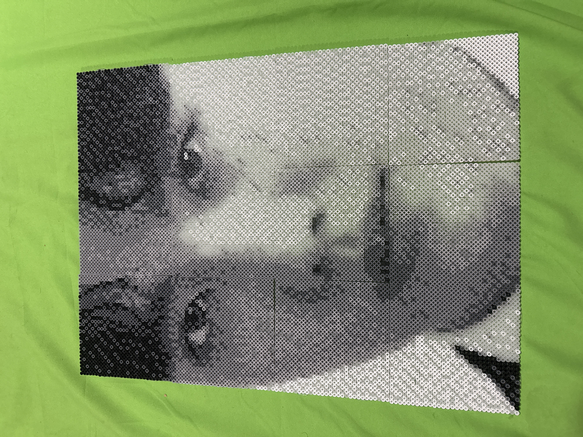 Beaded portrait artwork documented in Puebla, Mexico