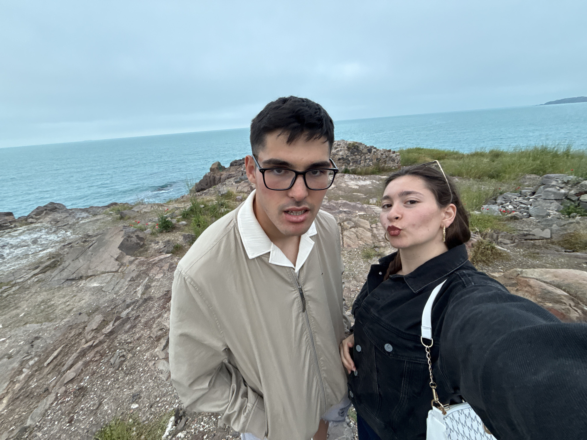Young adults photograph coastal visit in Sozopol, Bulgaria