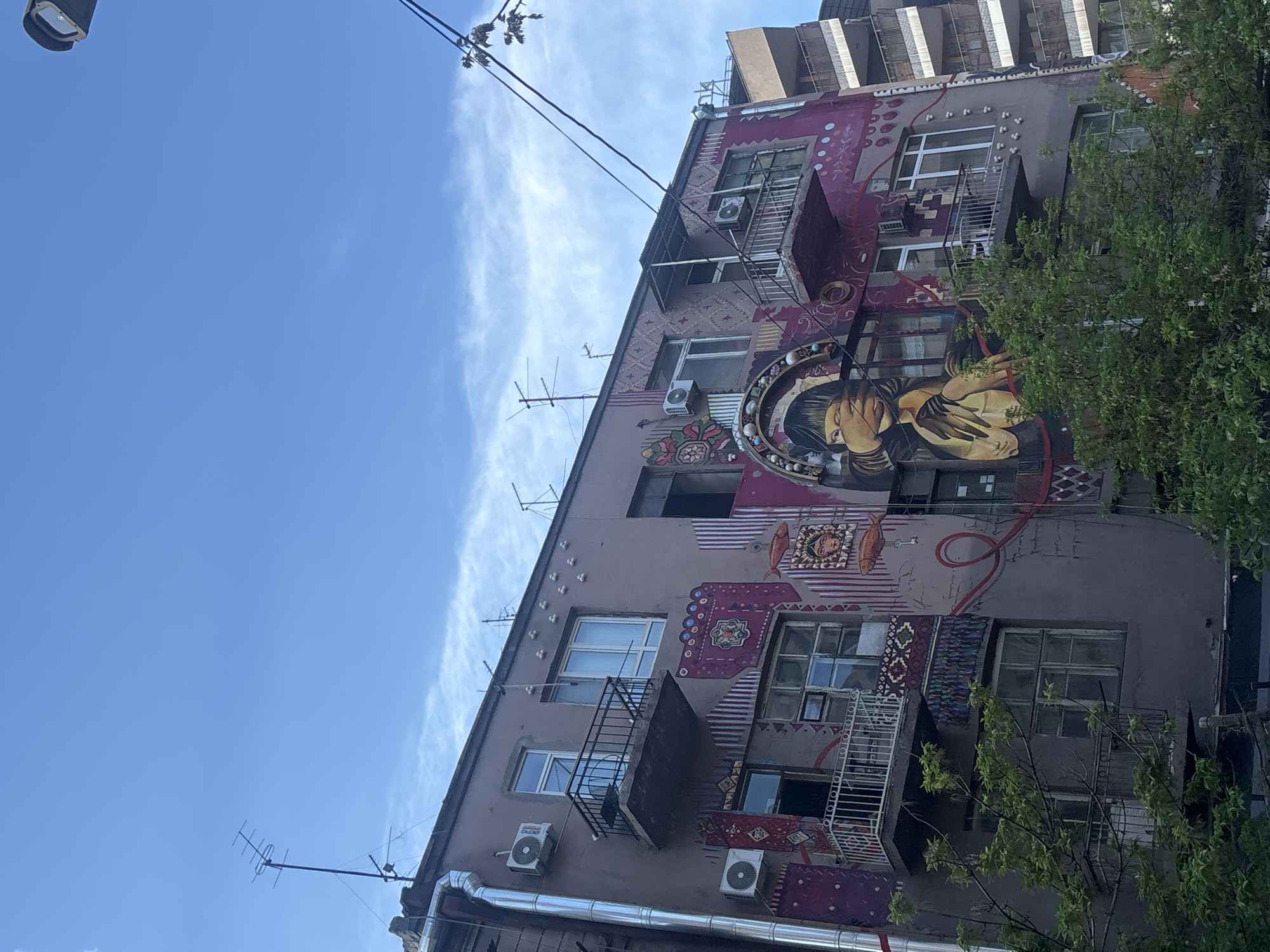Spring afternoon street life documented across Yerevan neighborhoods