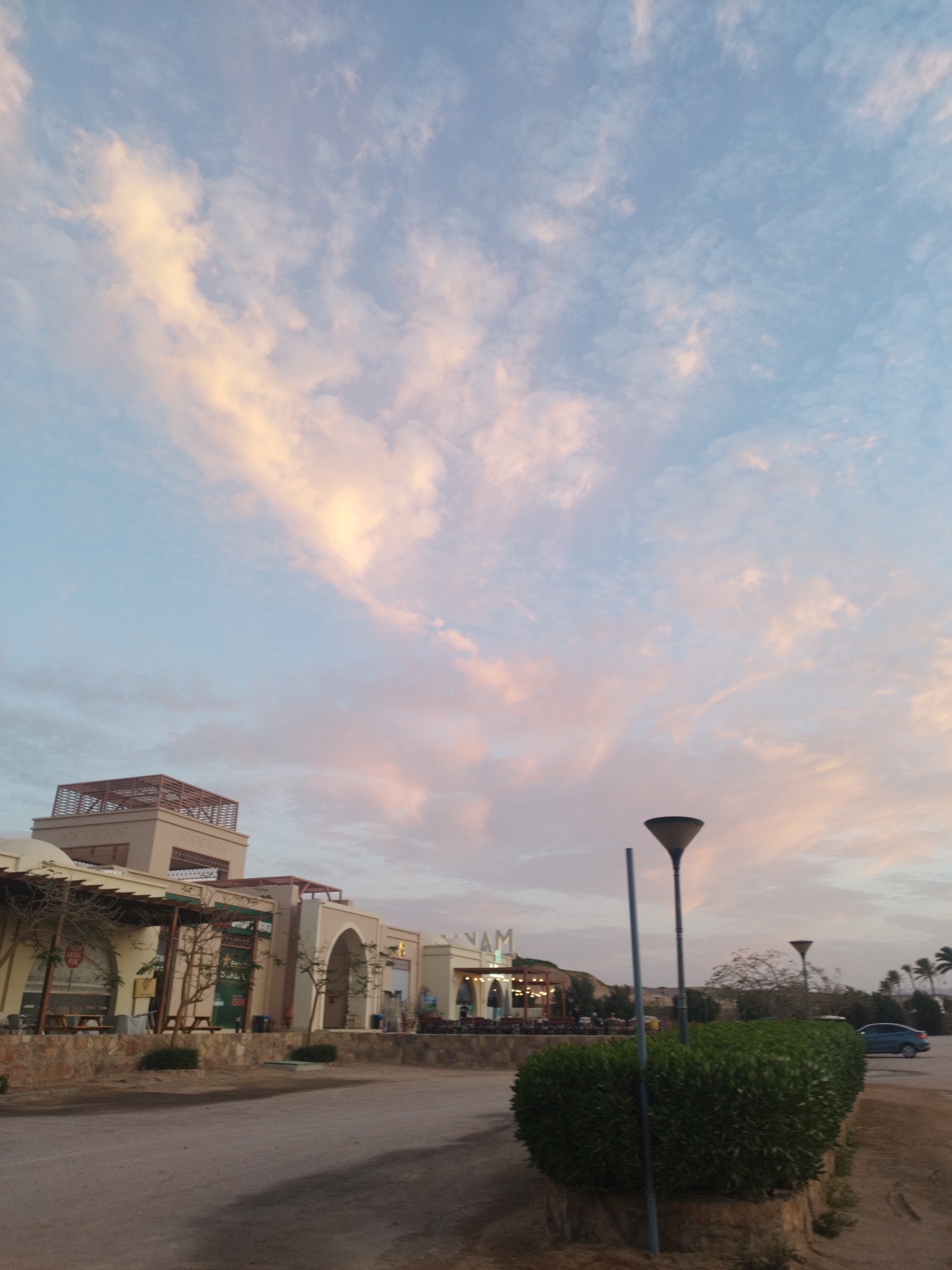 Sunset observed at Egyptian commercial area with colorful clouds