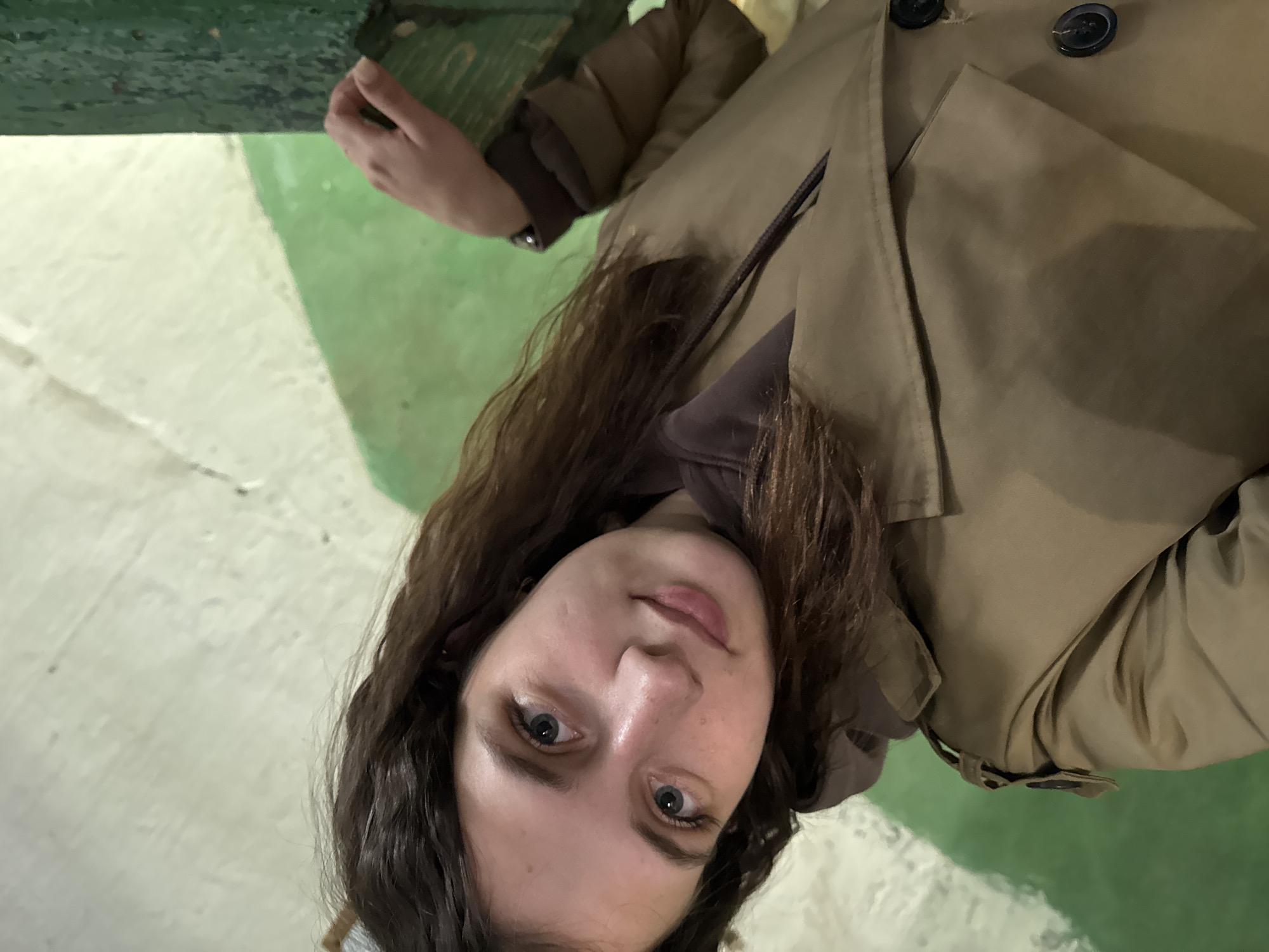 Woman photographed in dilapidated building interior, Vereshchagino Russia