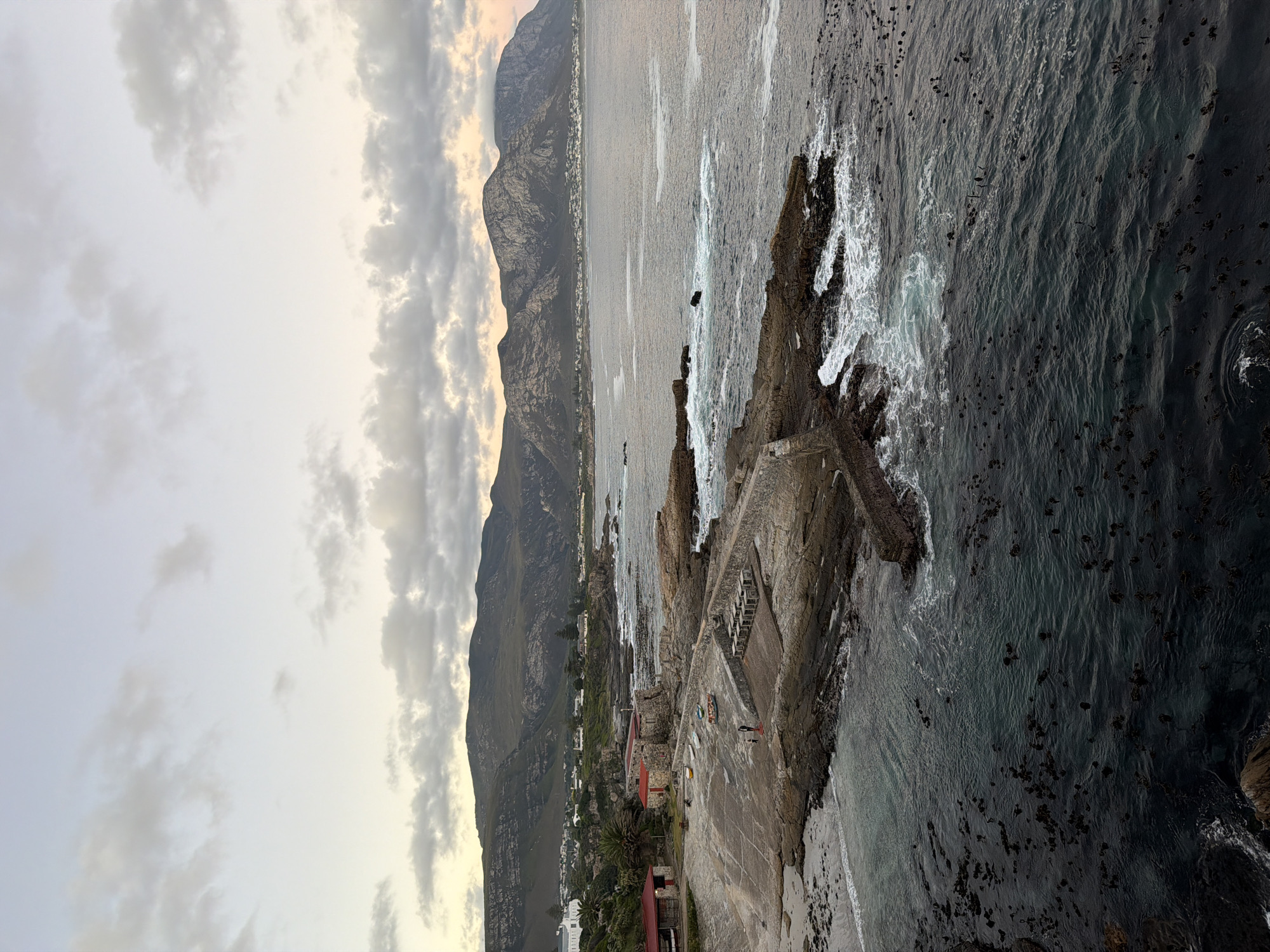 Dramatic coastal scenes documented in Hermanus during twilight hour