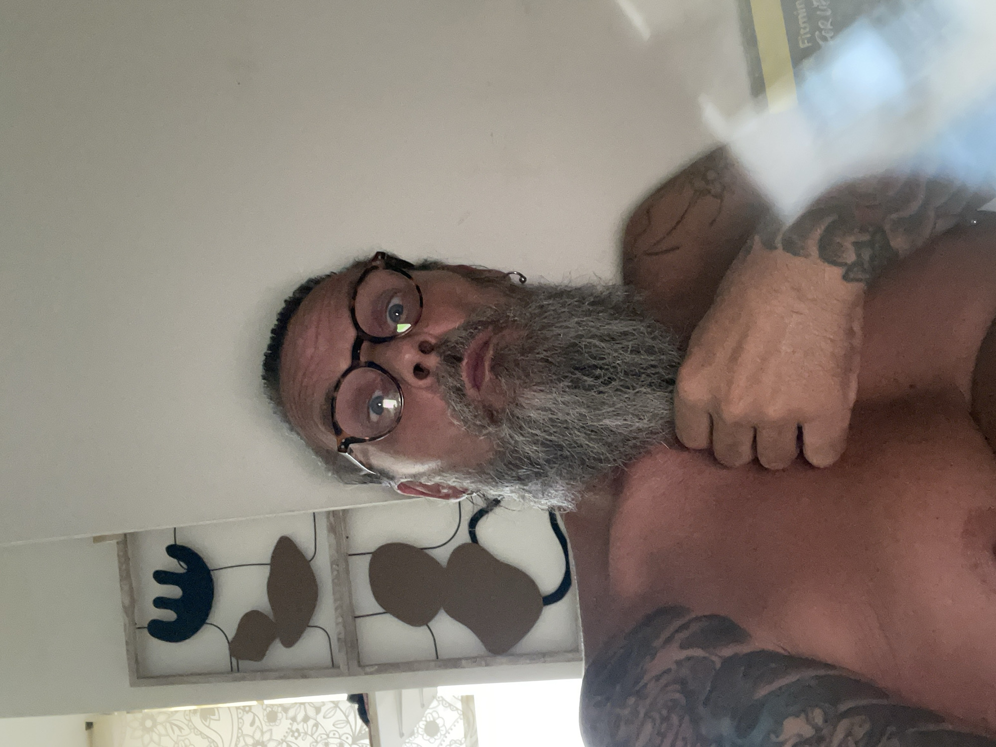Relaxed indoor selfie session in Netanya, same person, multiple angles.