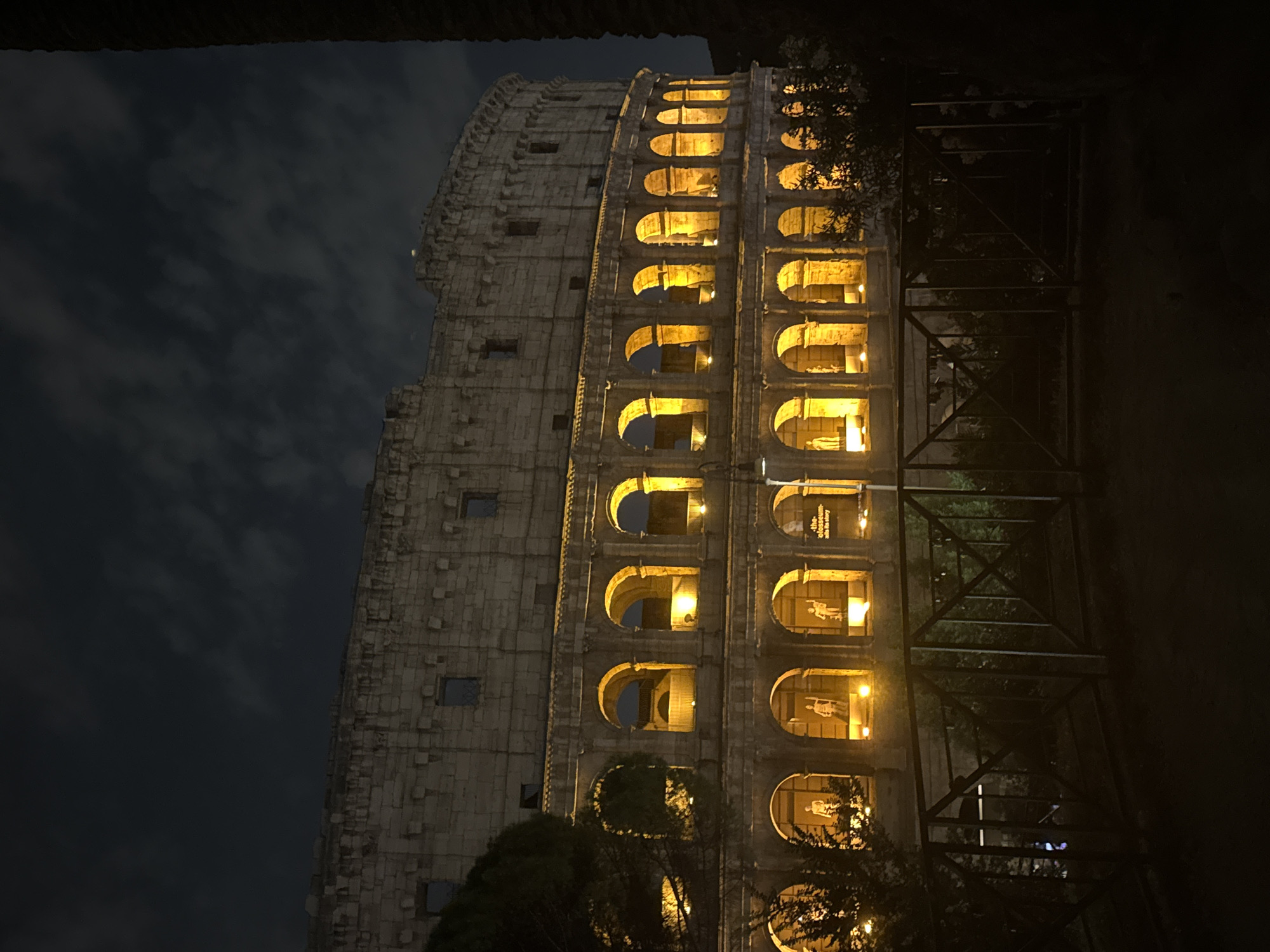 Evening photography session captures illuminated Colosseum in Rome