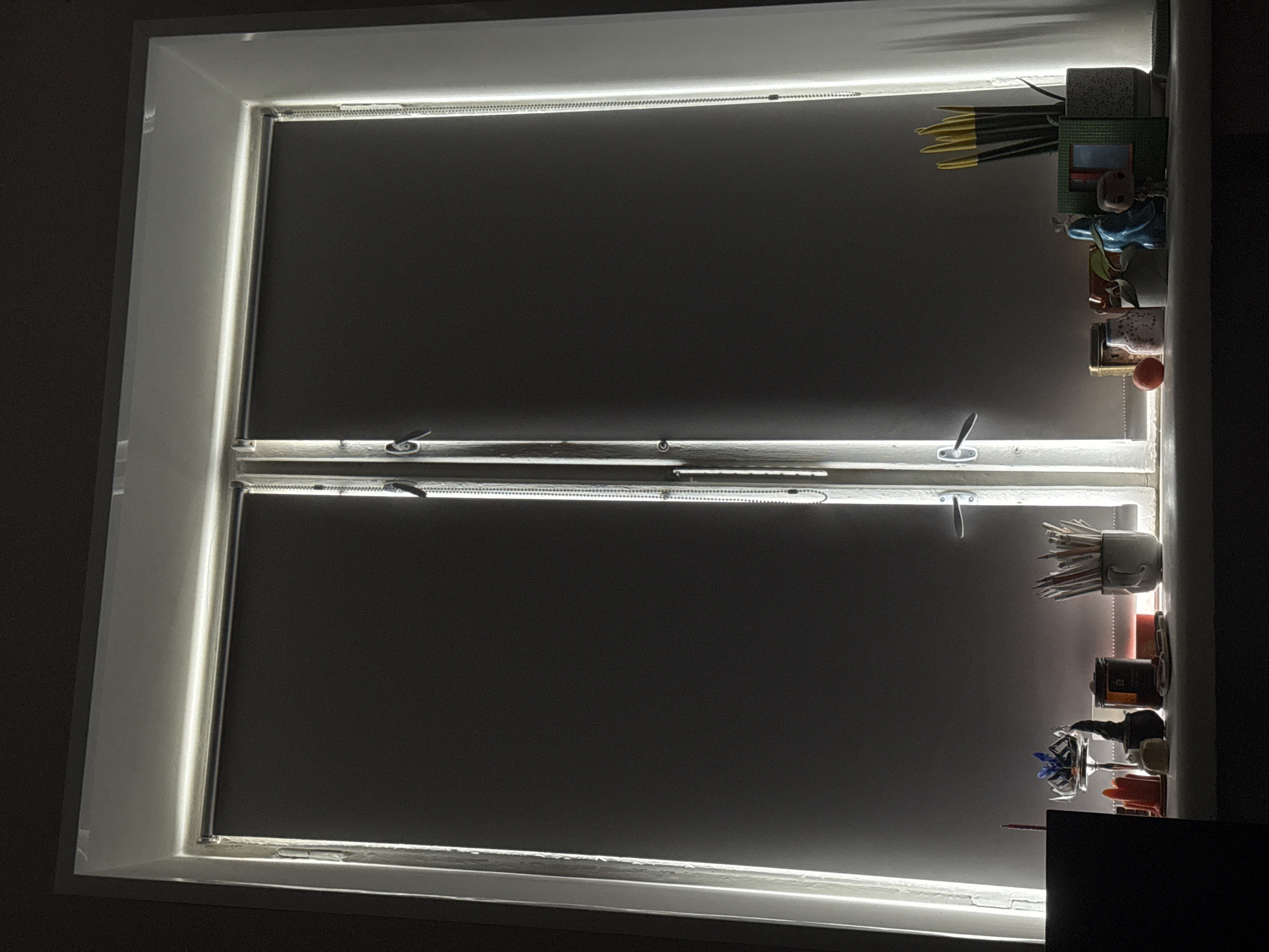 LED-lit window with dark shades observed in Moscow