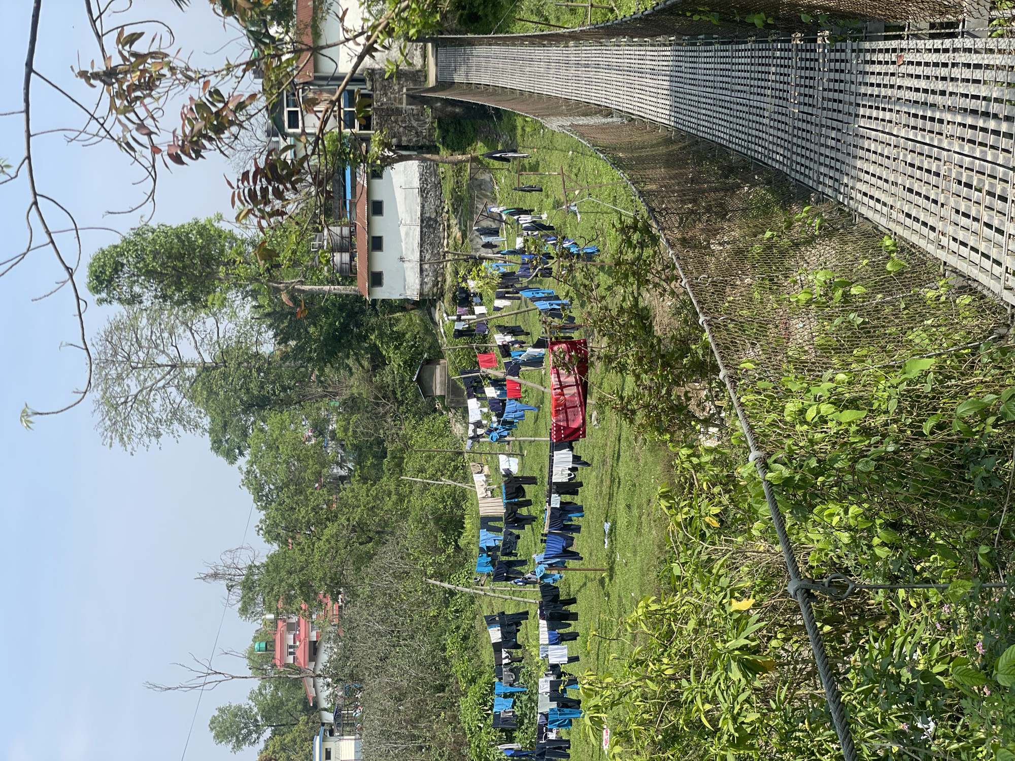 Morning life around suspension bridge in Pokhara, Nepal