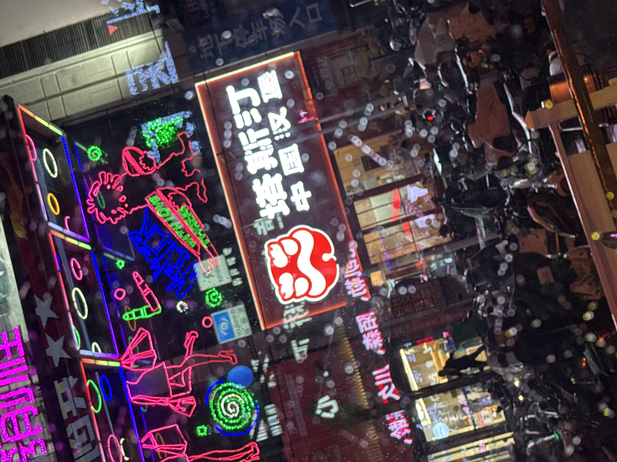 Neon signs illuminate Linghe district in daytime documentation