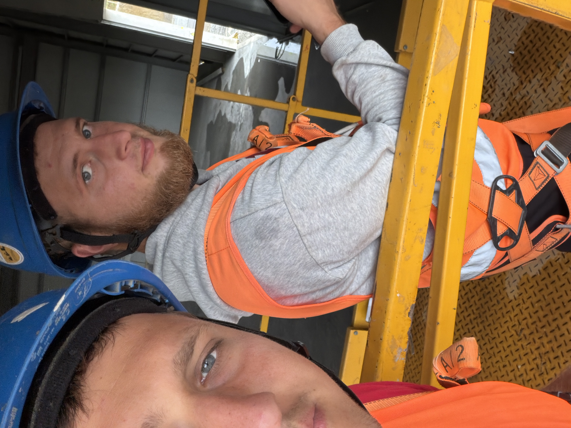 Construction crew on the job at an industrial build in Stróża