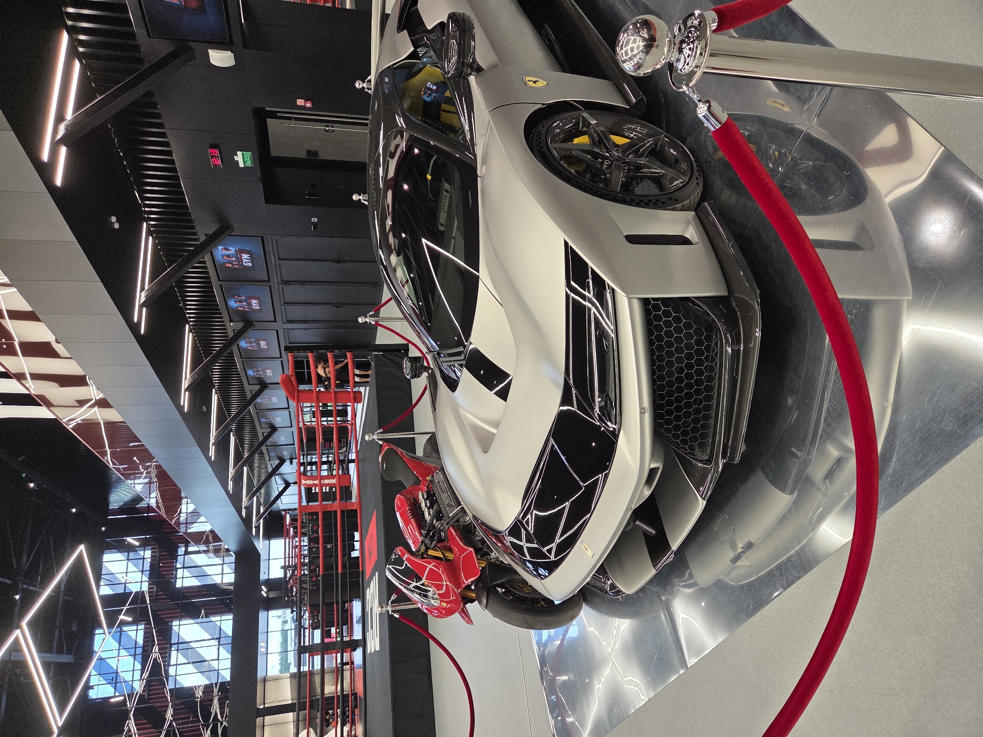 Ferraris on display inside a sleek Yekaterinburg boxing gym