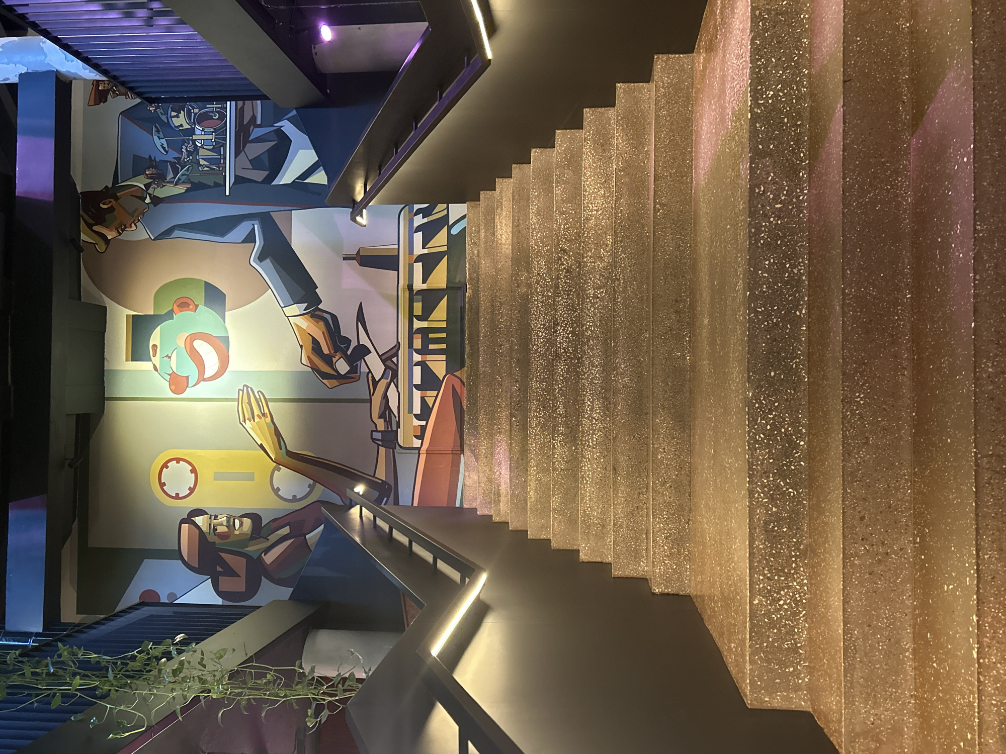 Exploring ornate multi-level marketplace with murals and industrial design