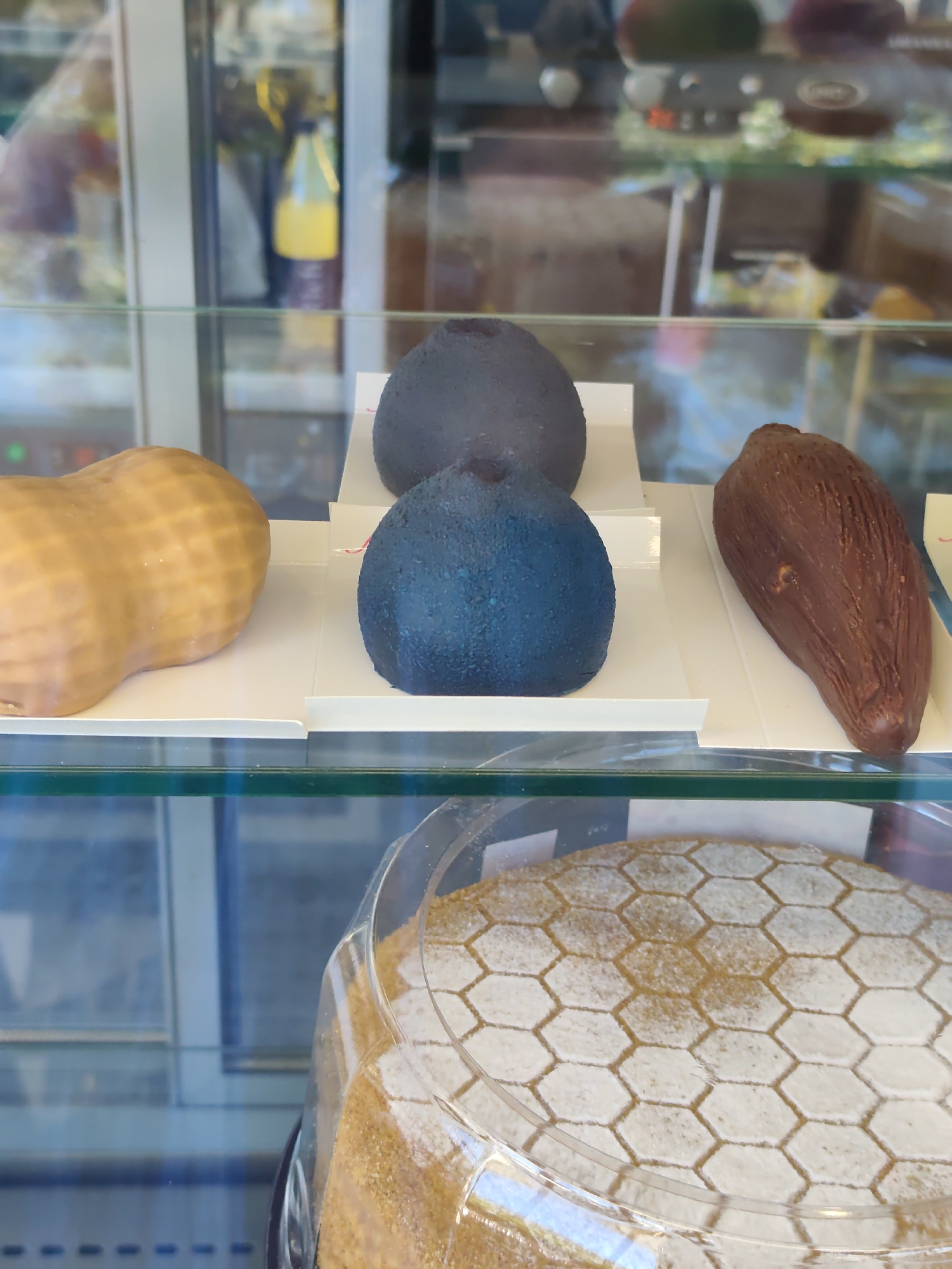 Inside a Sochi bakery café, pastries and preserves on display