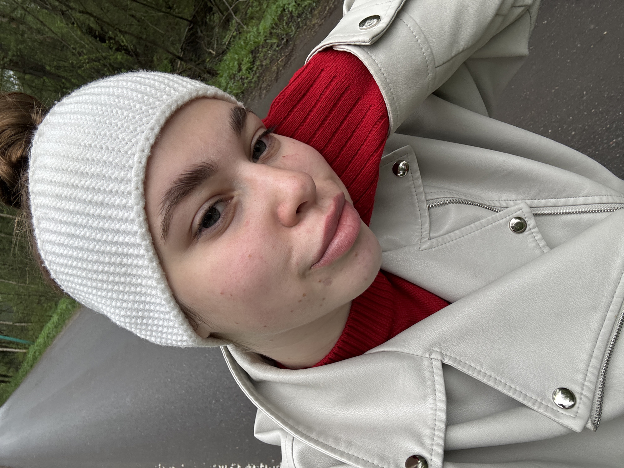 Woman photographed in rural Russian village during morning outing