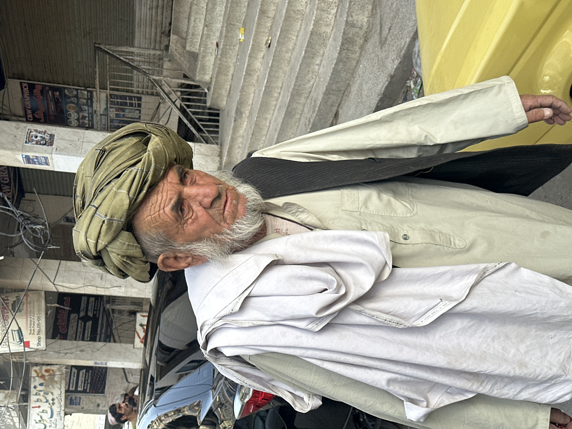 Everyday street life on a Quetta city pavement