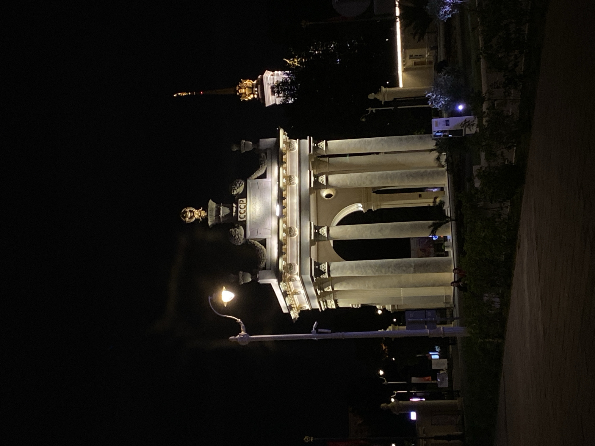 VDNKh at night, lit walkways and Moscow's iconic exhibition park