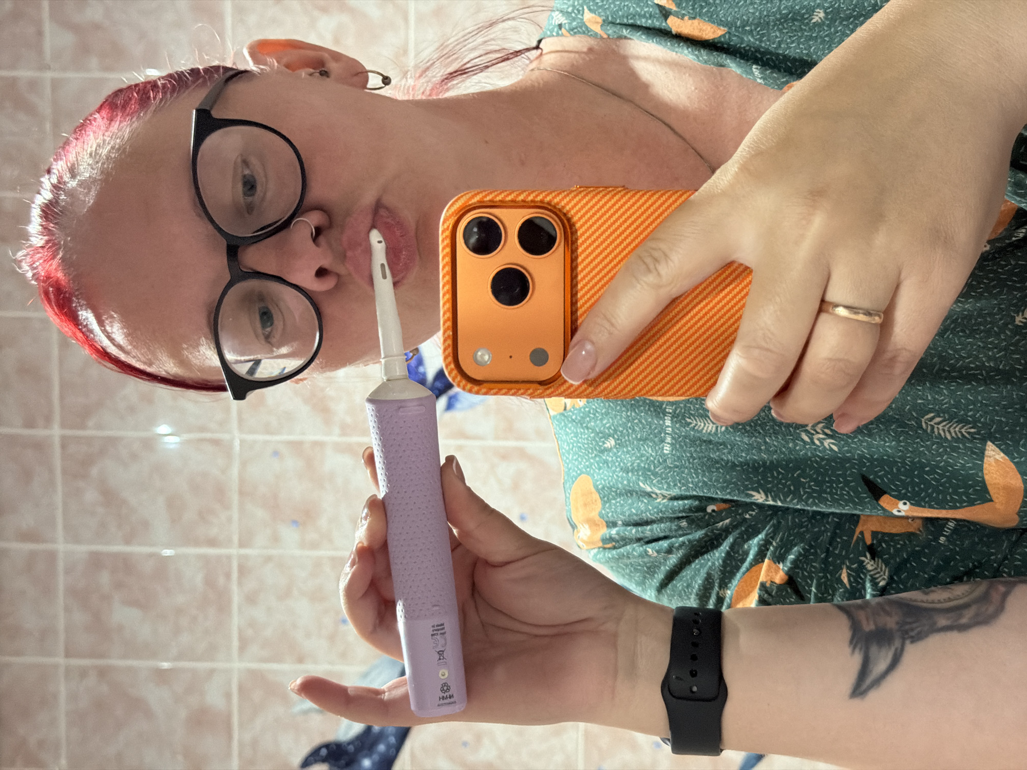 Woman multitasks dental hygiene and selfie in Russian bathroom