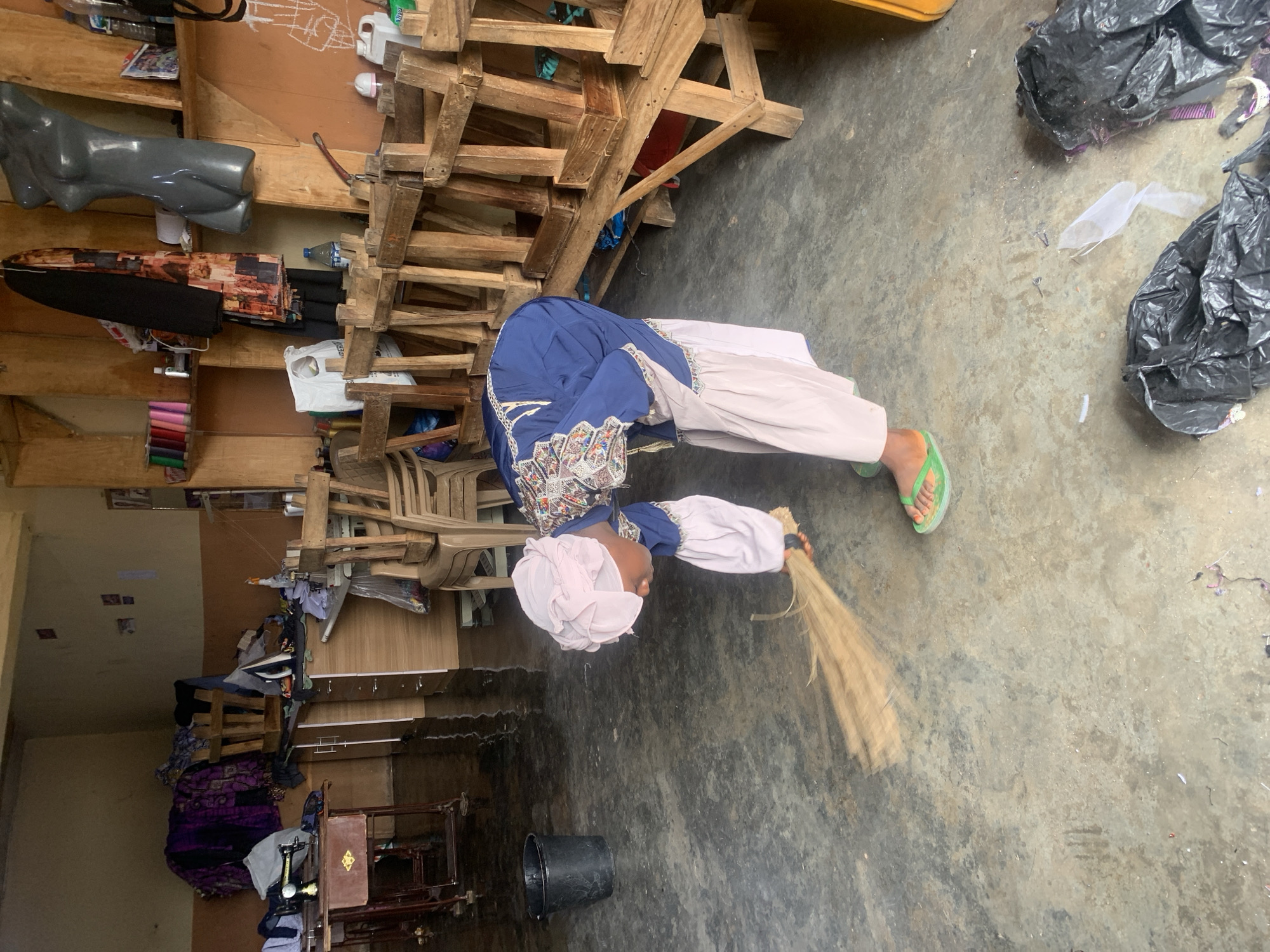 Morning routines around a Jos workshop and street