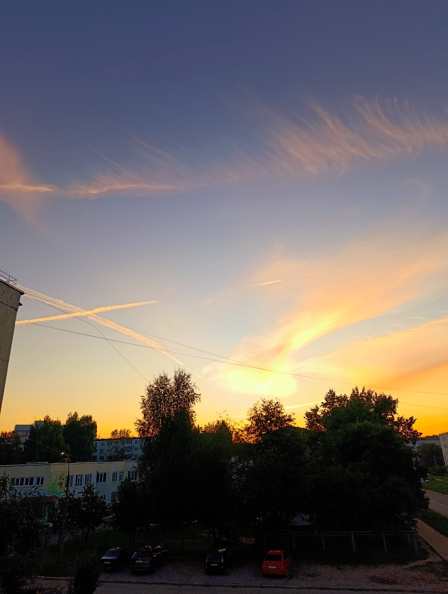 Vivid summer sunset over Chaikovsky's residential streets