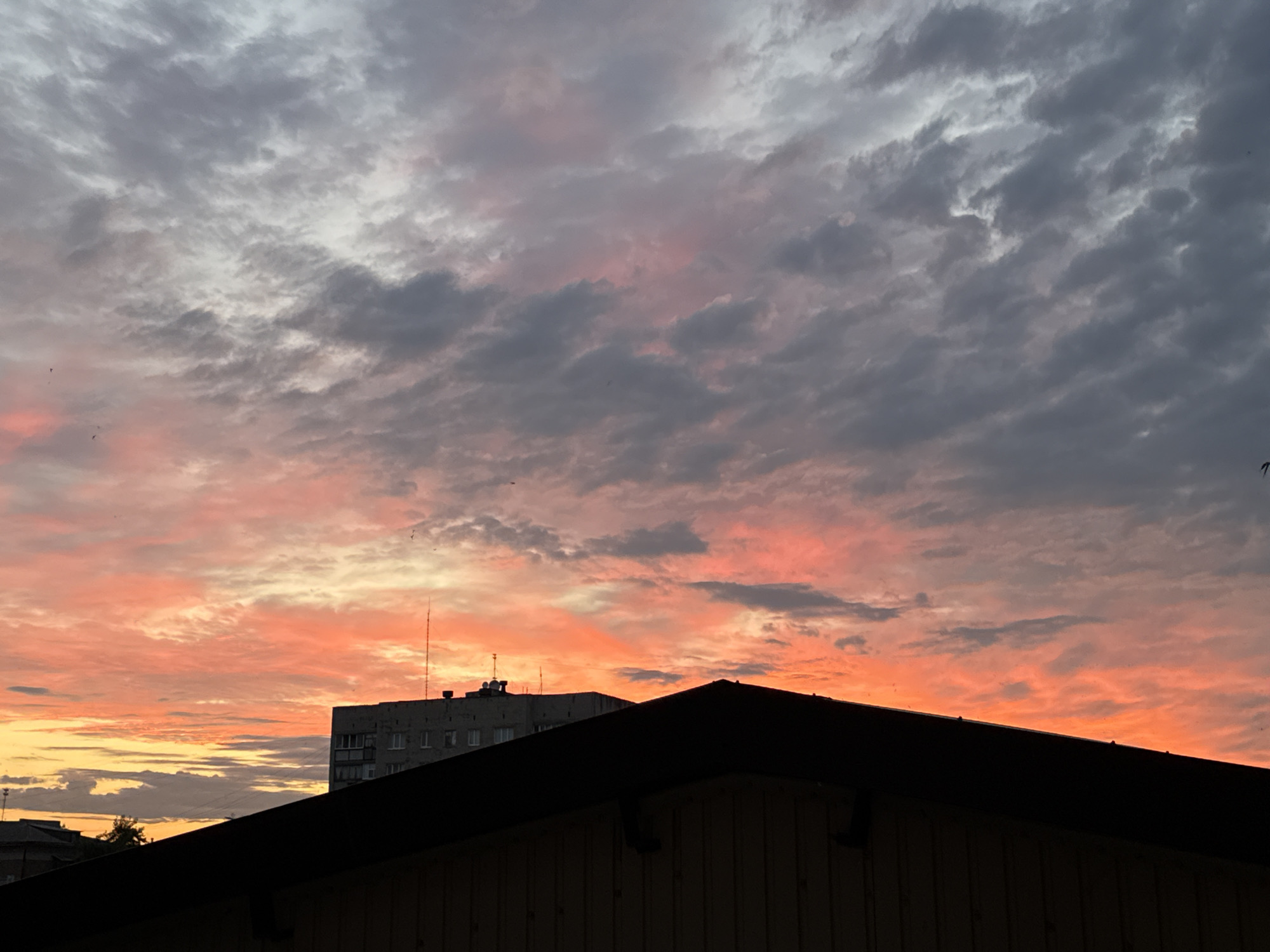 Vivid summer sunset over Luhansk, seen from multiple angles