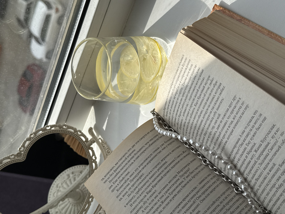 Personal belongings arranged in artistic flat-lay displays indoors