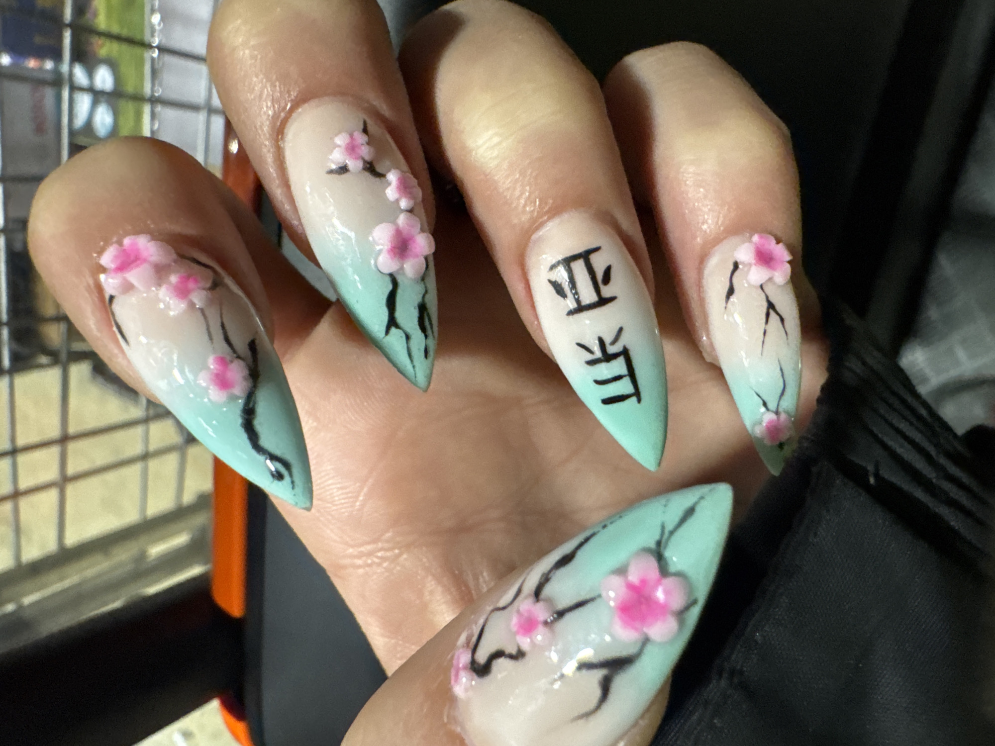 Elaborate nail art designs photographed in Kettering