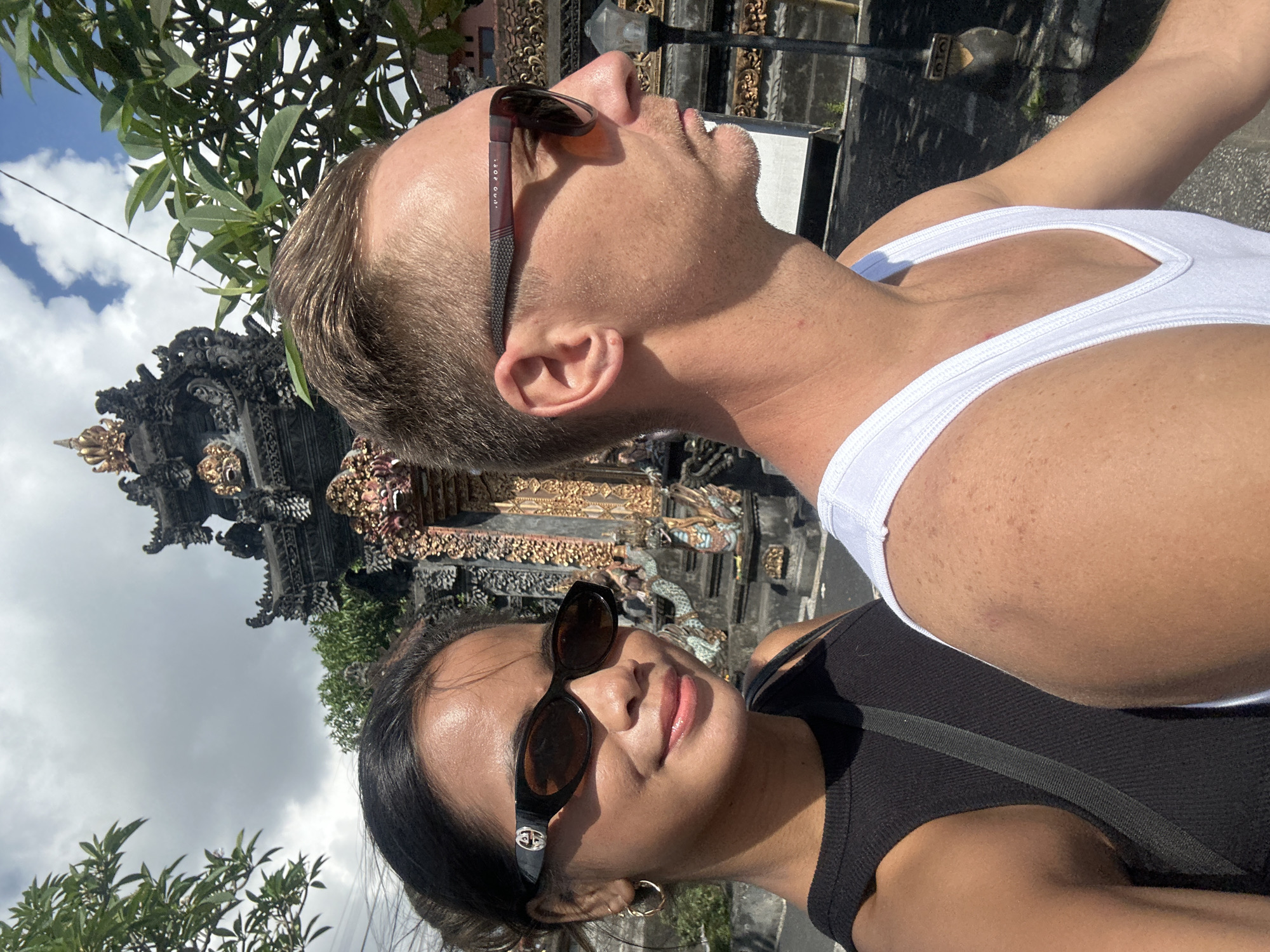 Selfies and portraits near Balinese temple gate in Sukawati