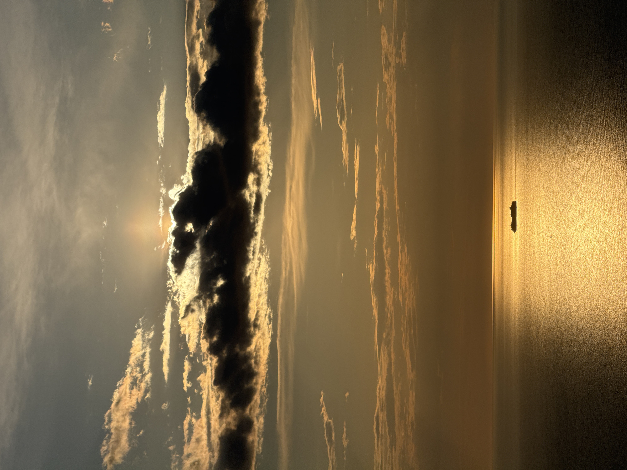 Sunset captured over Montenegro waters with distant island visible