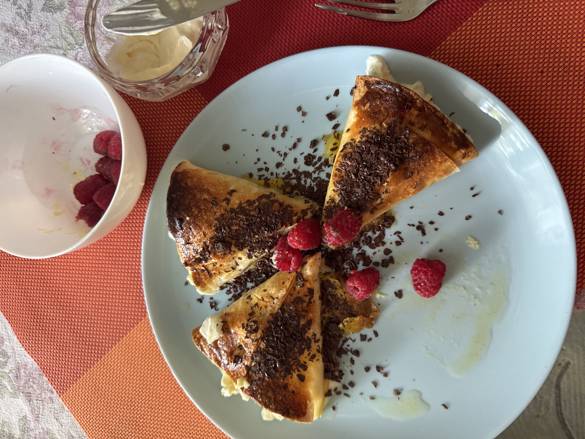 Breakfast table spread with pastries and fresh fruit, Chernivtsi