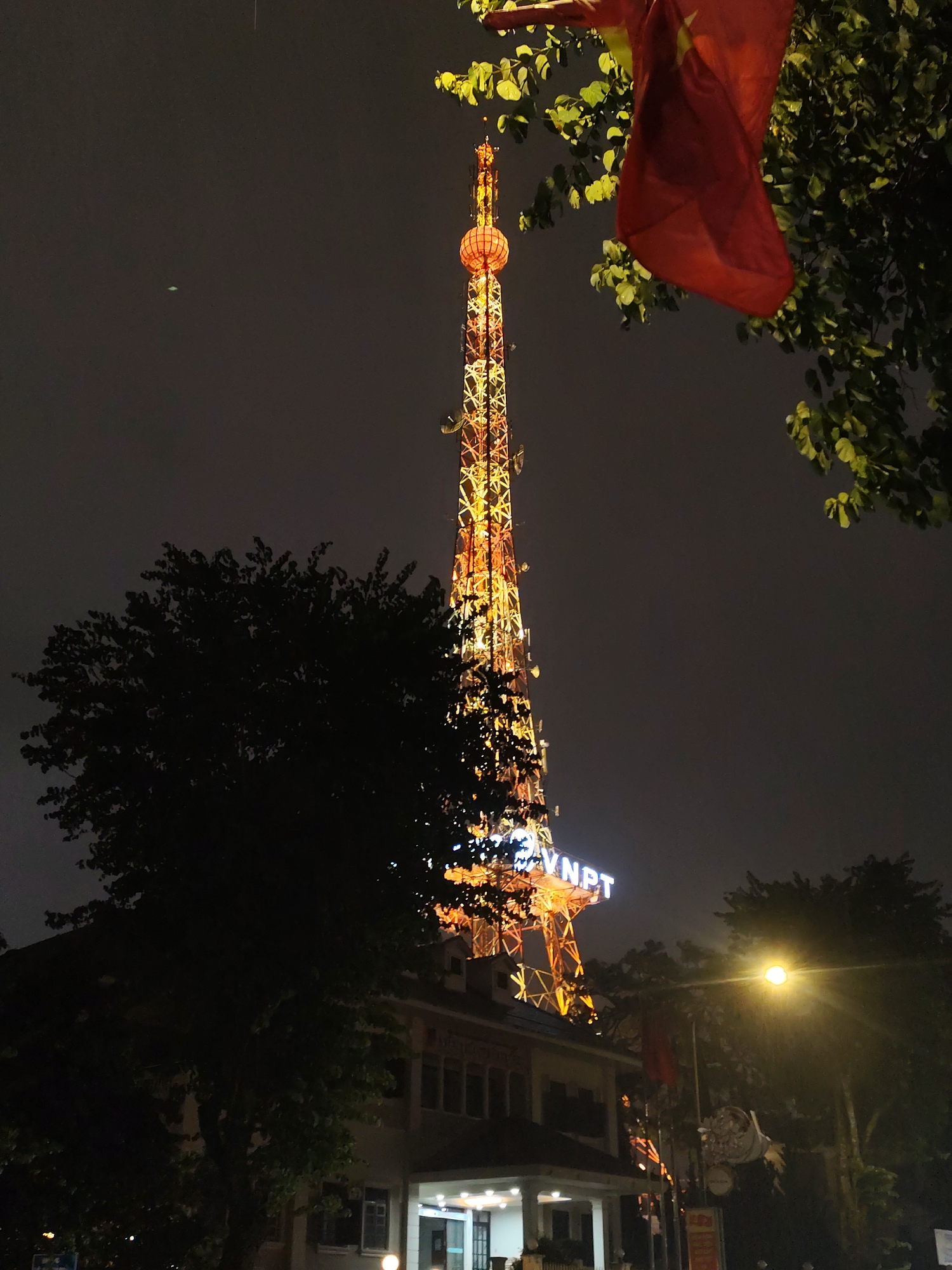 Rainy night out through Da Lat's lit streets and landmarks