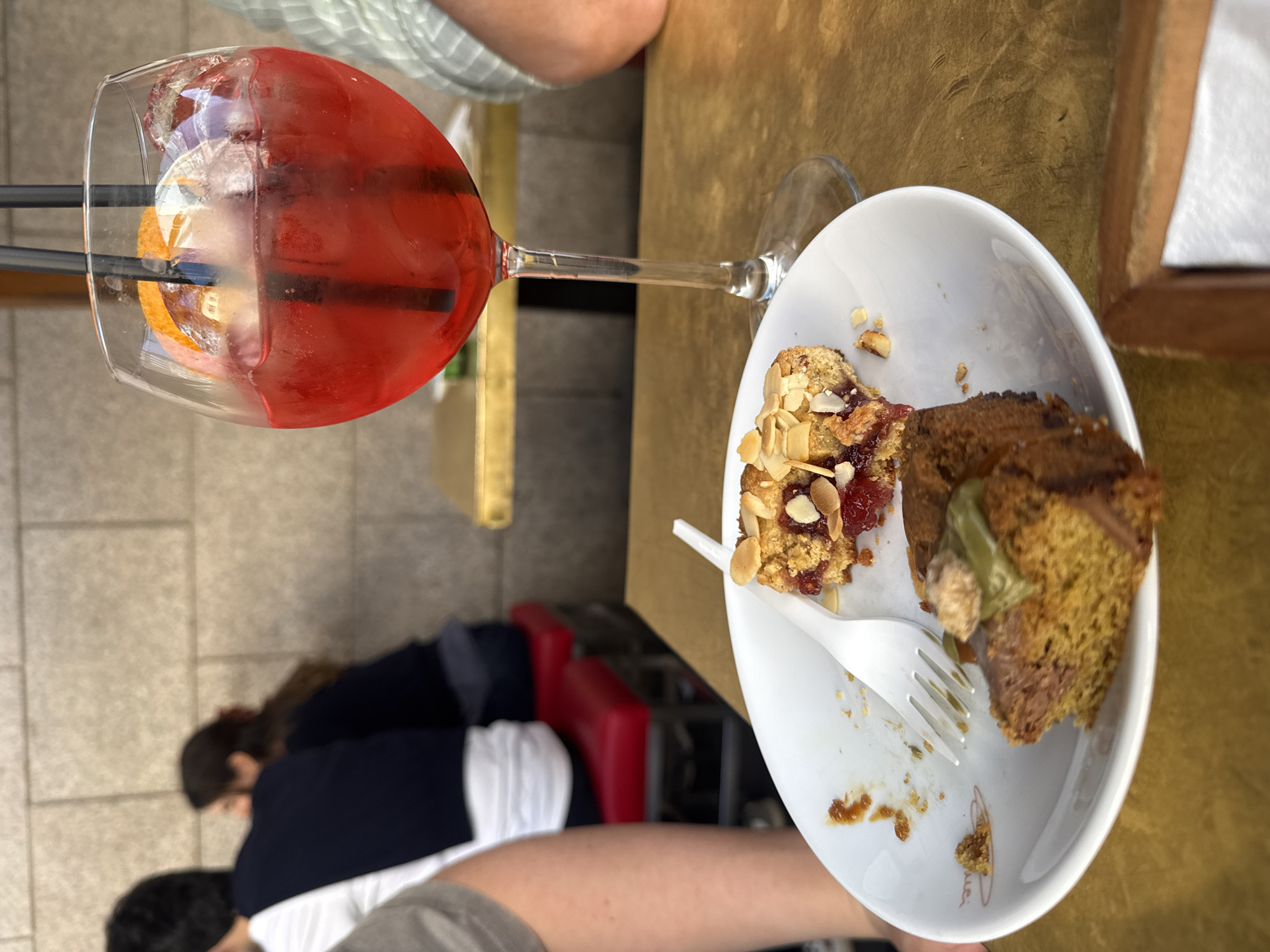 Dessert moment captured at Milan outdoor cafe