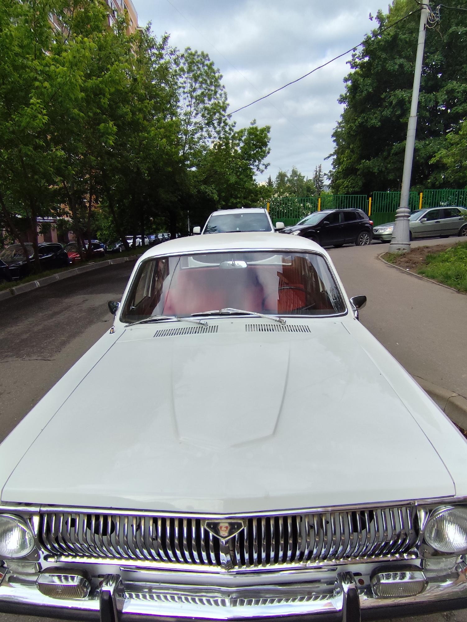 Early morning Moscow scenes feature vintage Volga car, metro train