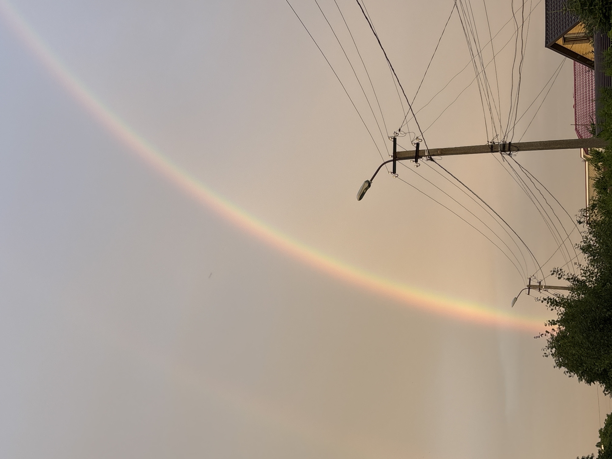 Double rainbow over Stavropol on a hazy summer evening