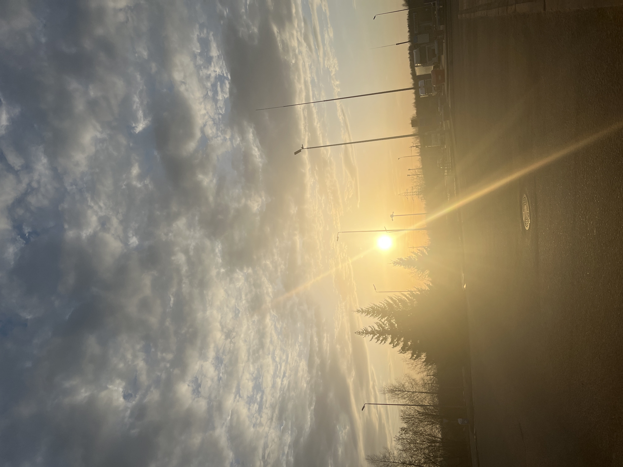 Car refueling at gas station during sunset in Klin