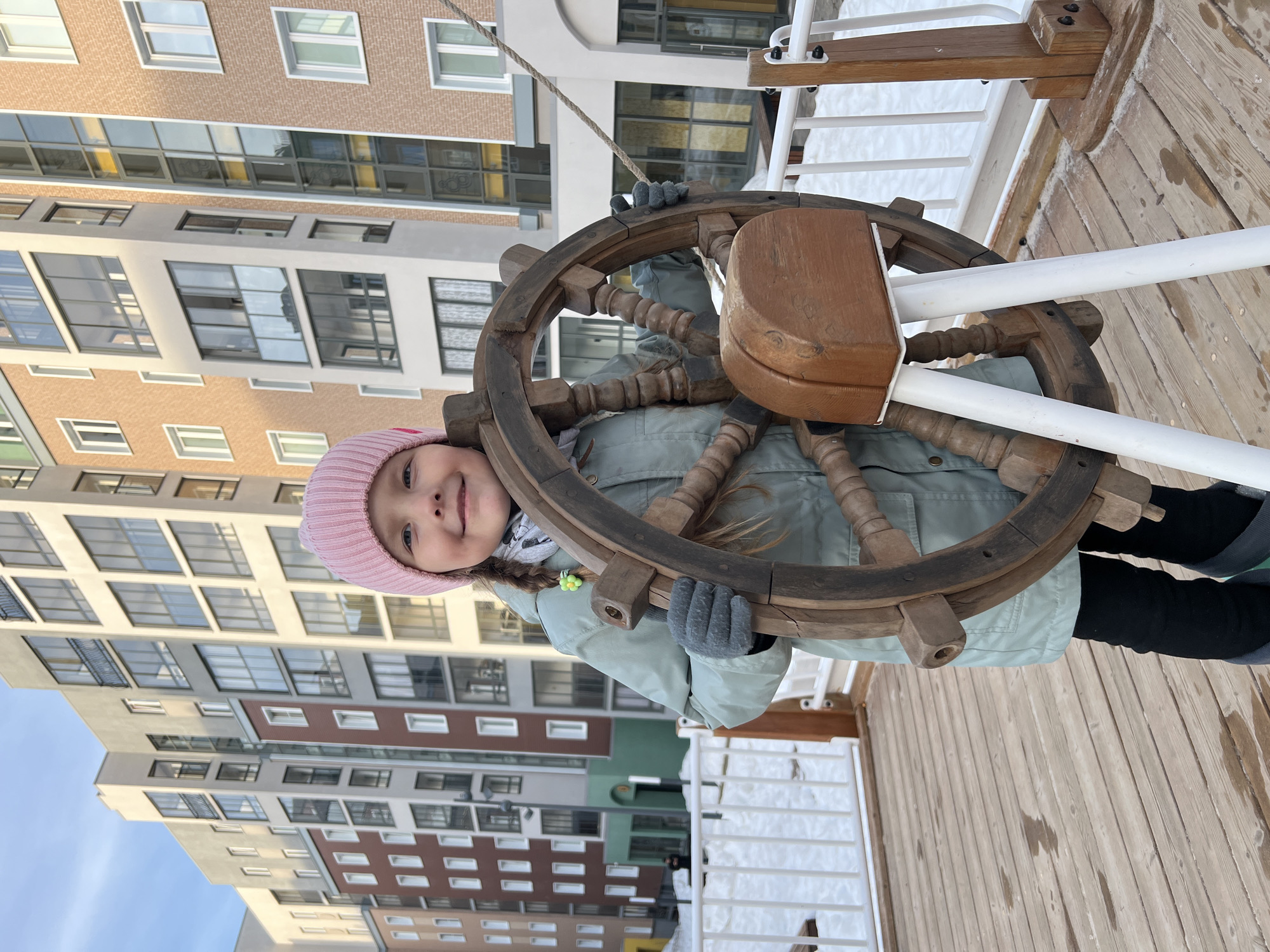 Families enjoy pirate ship playground in snowy Russian courtyard