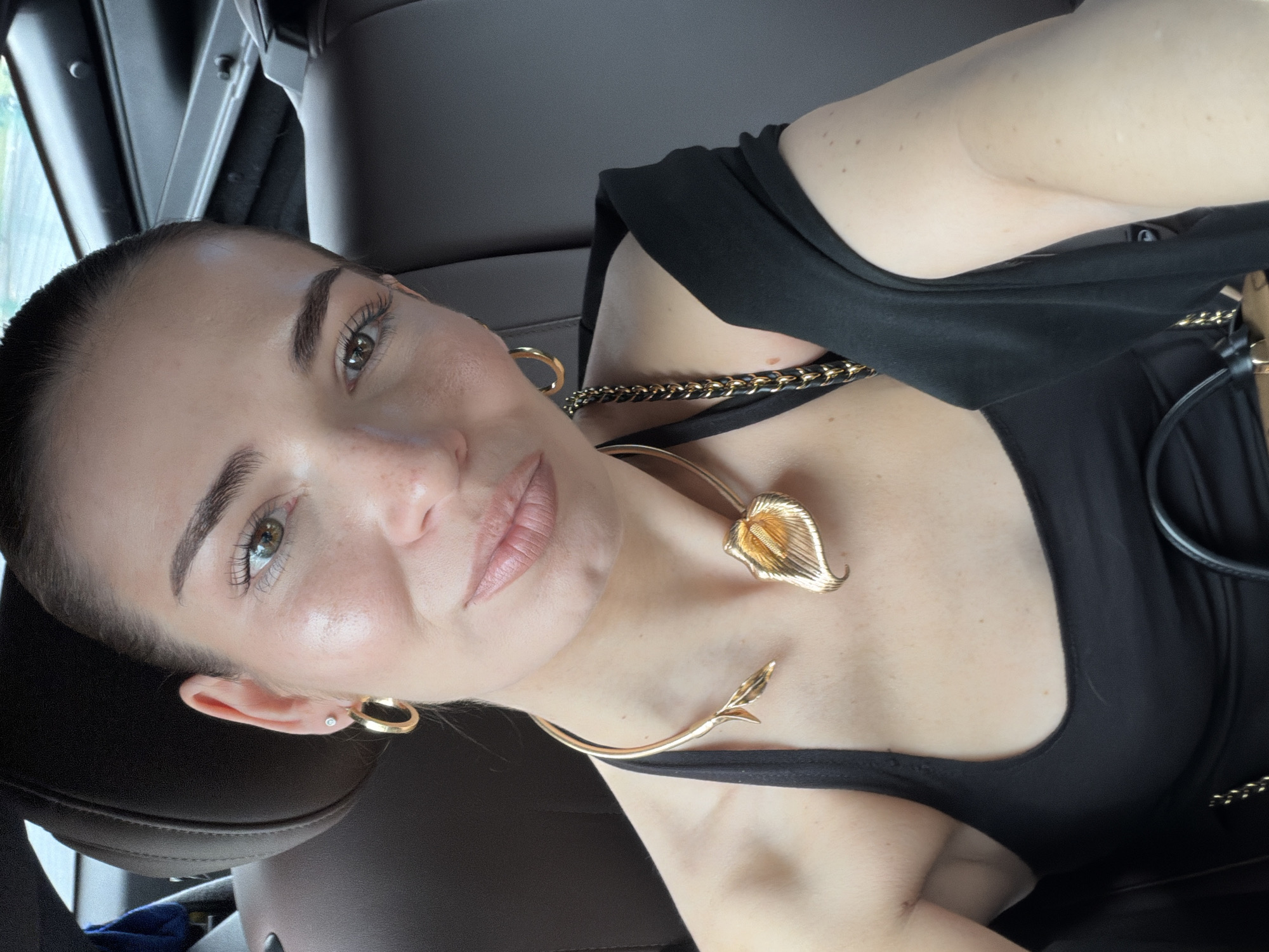 Woman films selfie videos in car, Panyu District