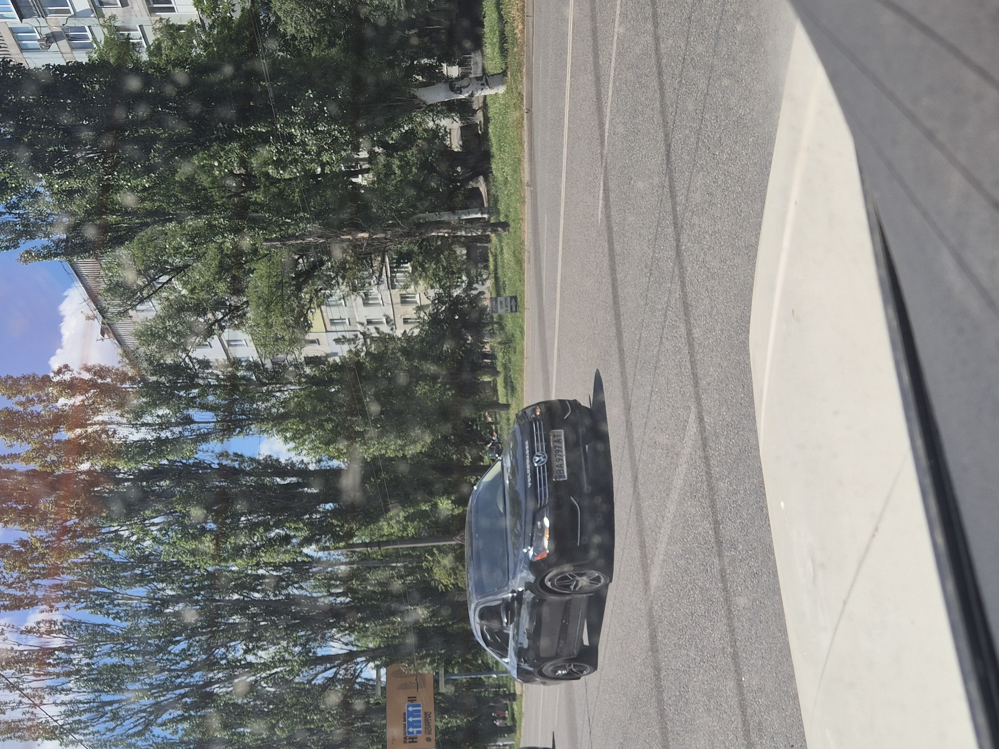 Everyday traffic moving through Kropyvnytskyi streets on a clear morning
