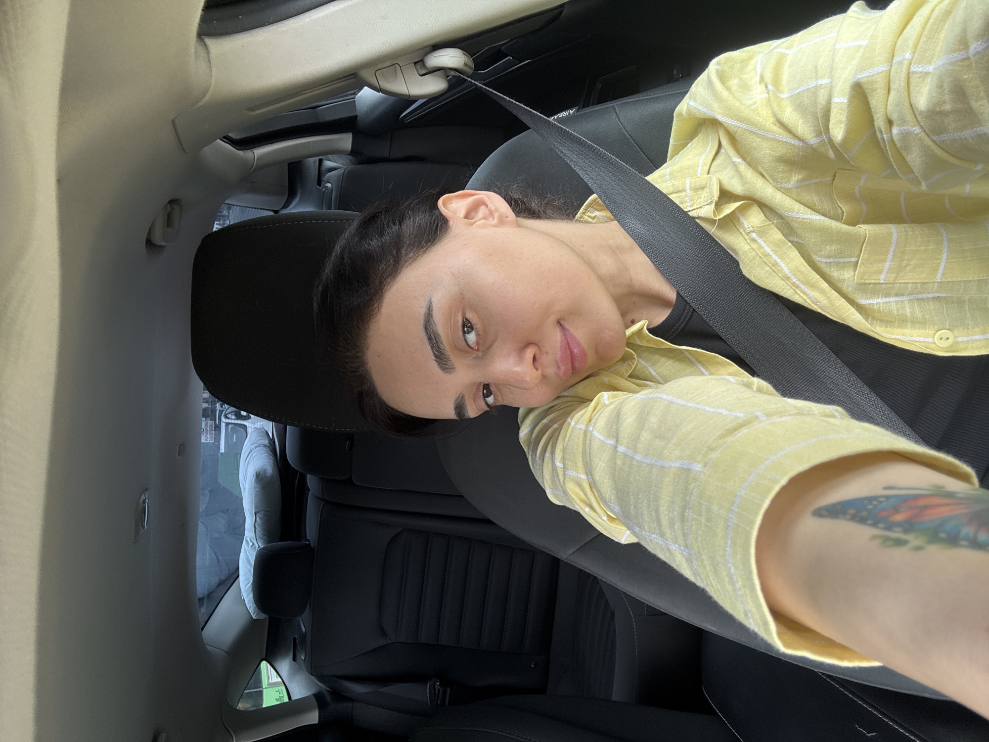 Passenger takes selfies in car in Tbilisi