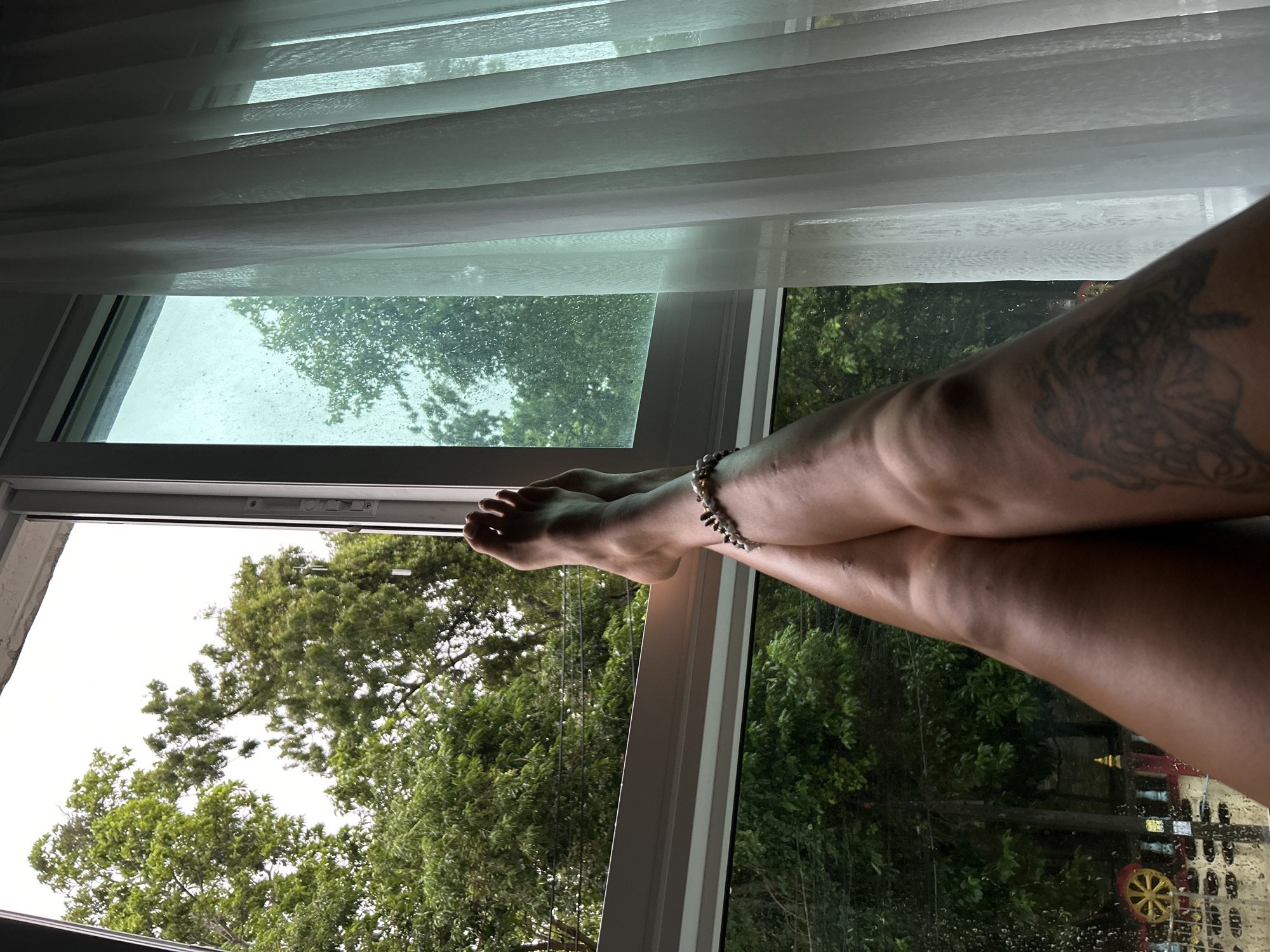 Rainy morning routine documented in Kathu, Thailand home