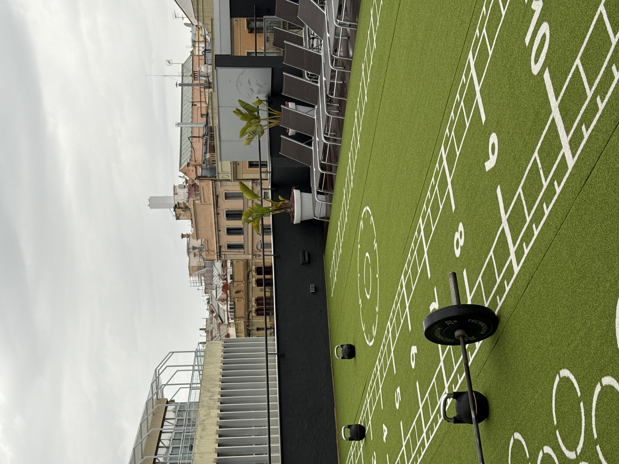 Rooftop gym activity captured near Barcelona's Sagrada Família