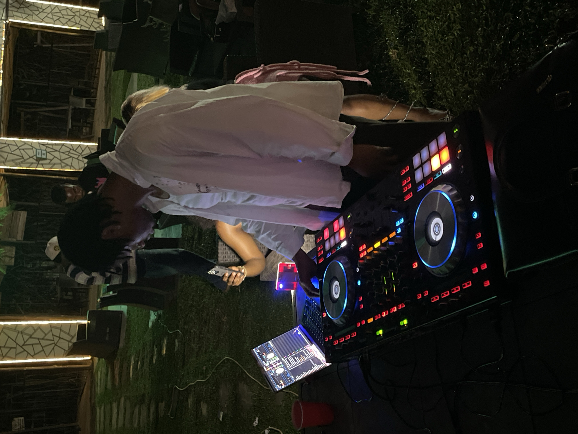 Late-night outdoor party in Abuja with DJ and dancing