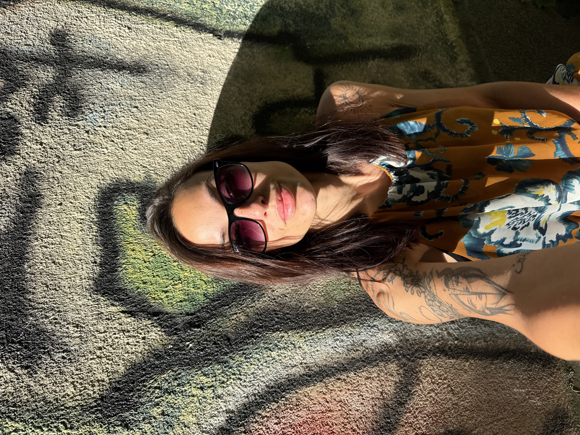 Woman rests on painted surface in Pleven, Bulgaria