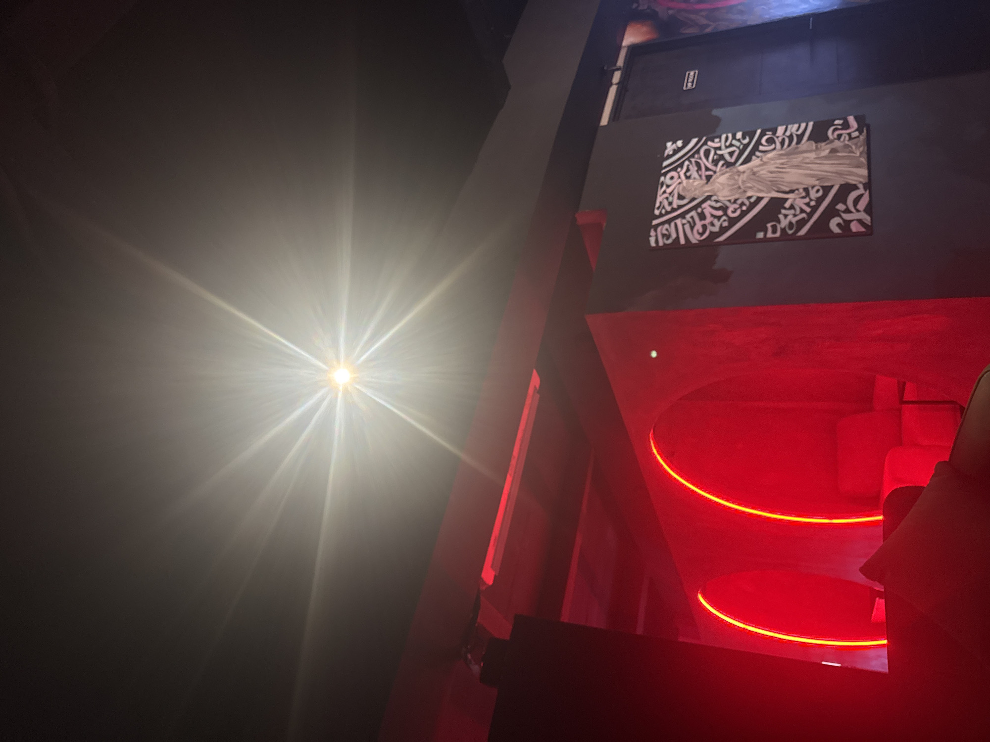 Gaming session in decorated Indonesian interior space captured
