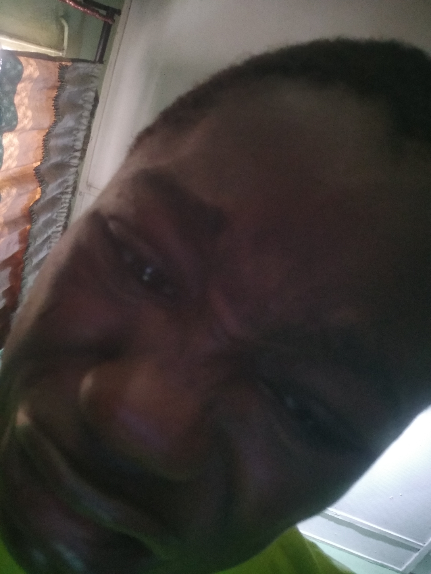 Person documents morning selfie session in Shangisha, Nigeria