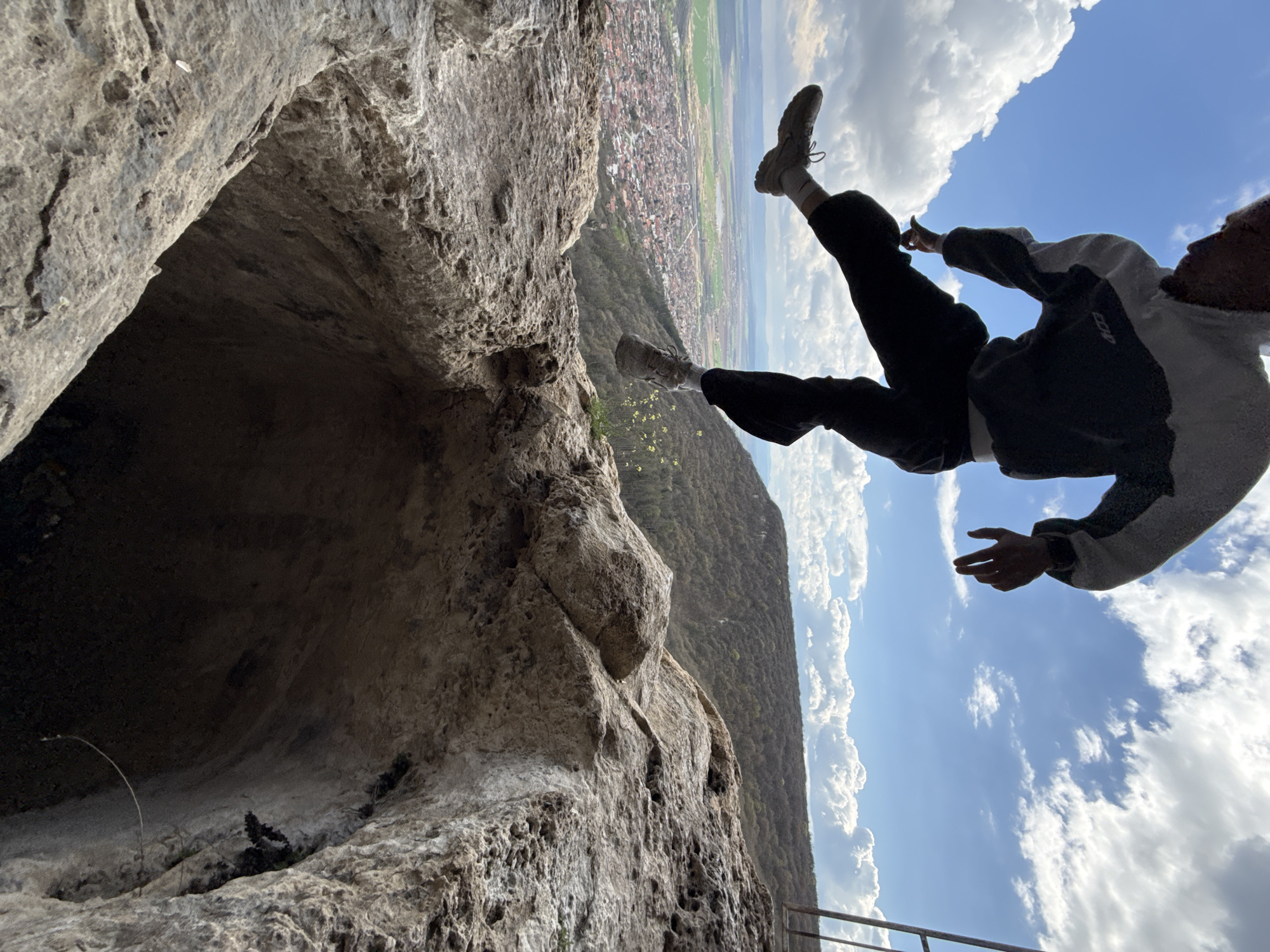 Person dangles from cliff overhang in Shumen, Bulgaria