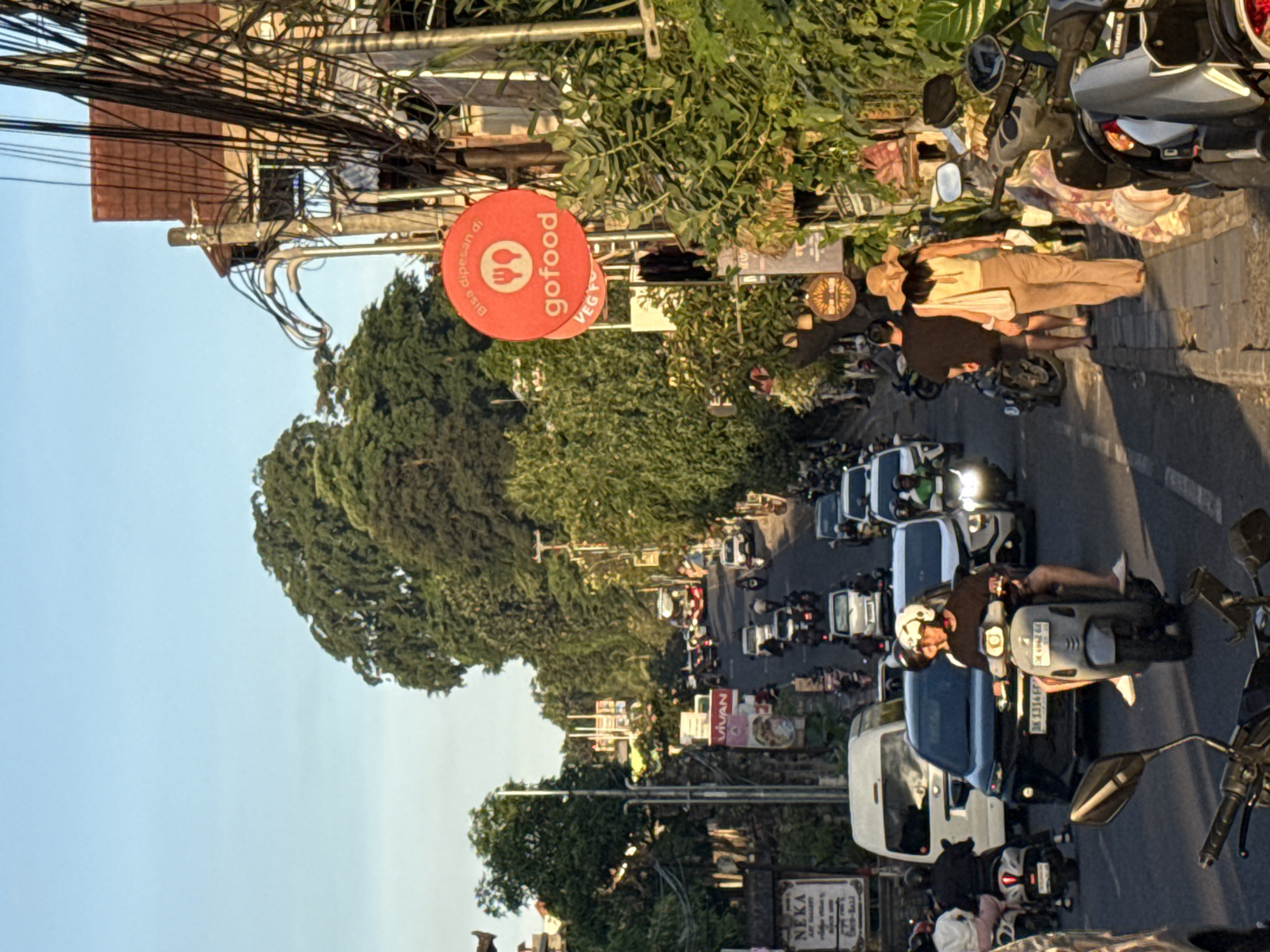 Traffic and temple scenes captured in Ubud District