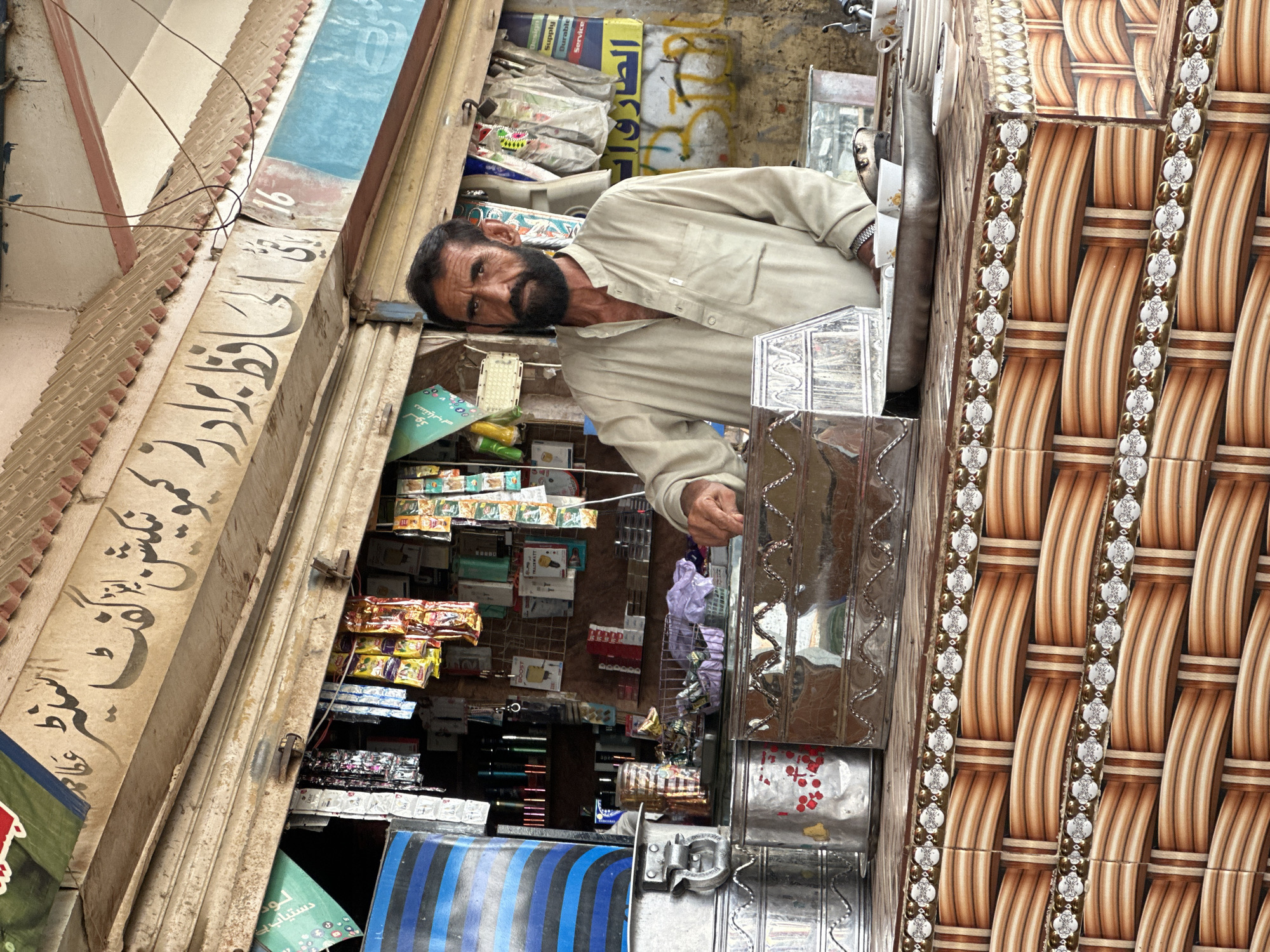 Street-level commerce and traffic in Hub, Pakistan