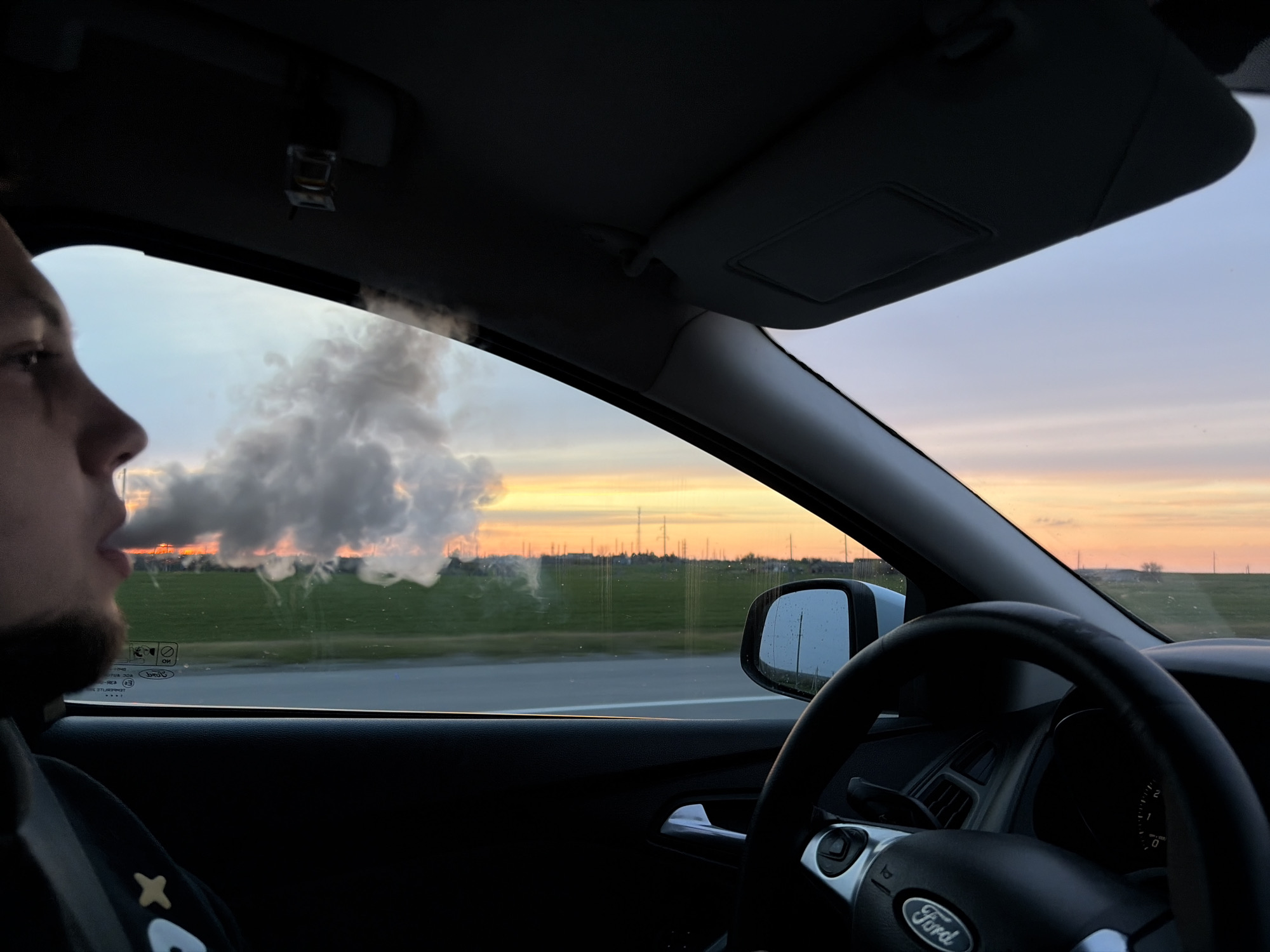 Smoke cloud observed from vehicle in Alexandrovka, Russia