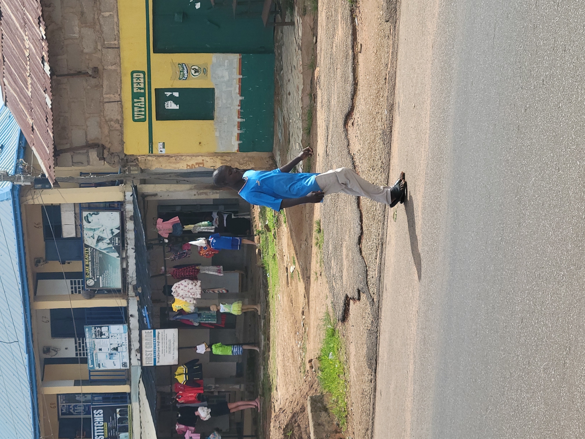 Morning street life in Jos, Nigeria markets and shops