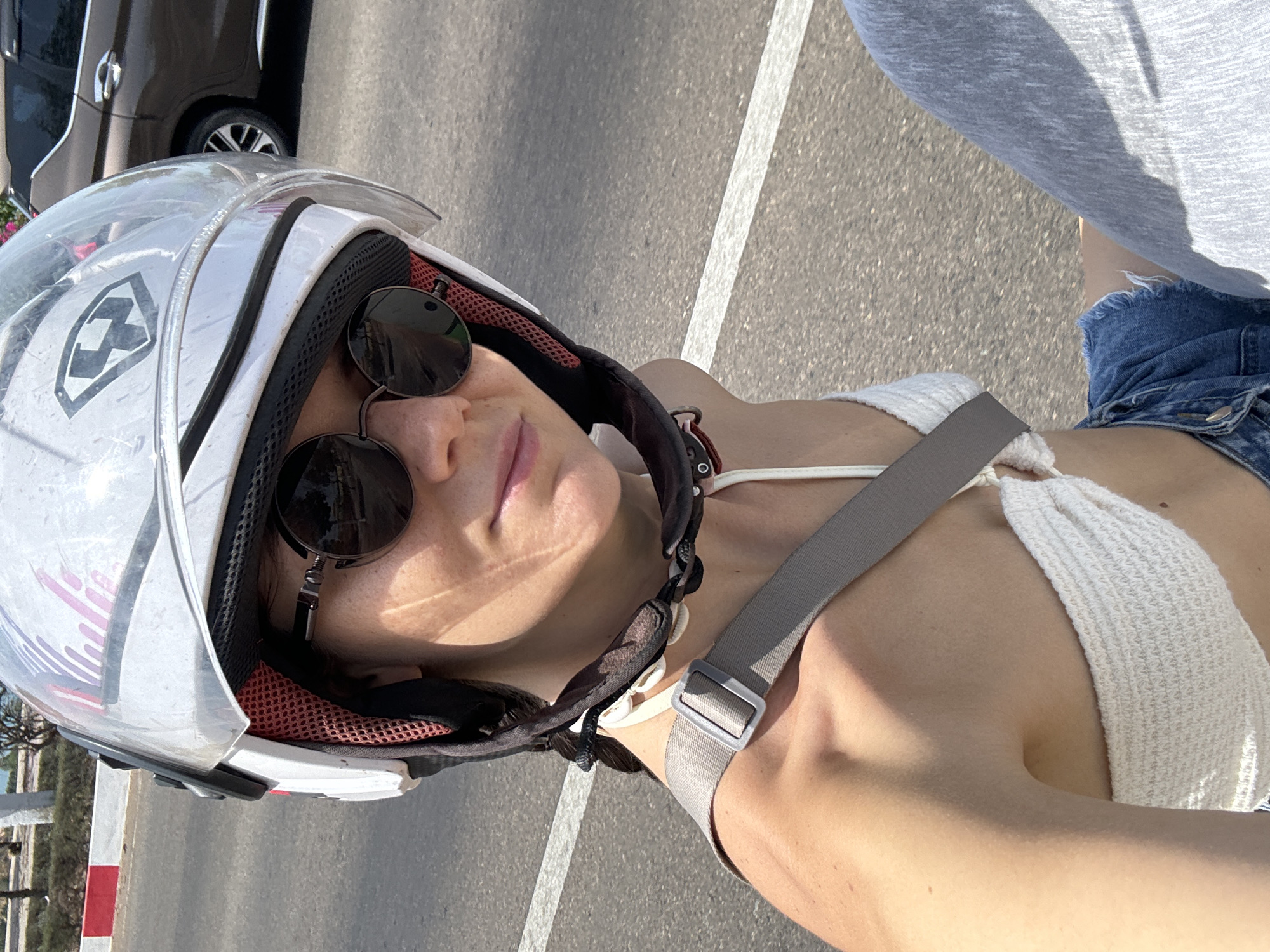 Woman rides motorcycle through Phu Thuy Ward, Vietnam