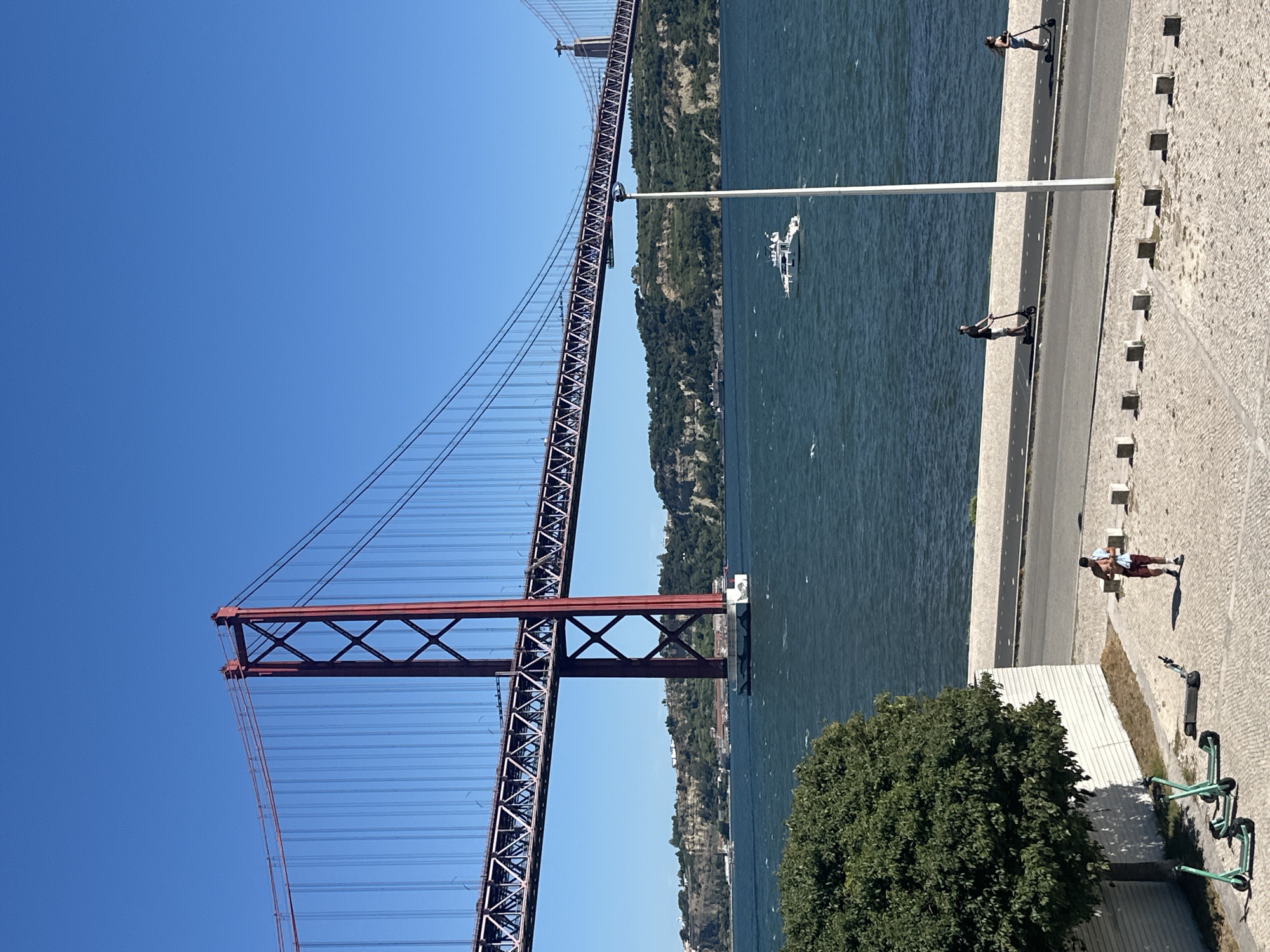 Lisbon's 25 de Abril Bridge from every angle on a sunny afternoon